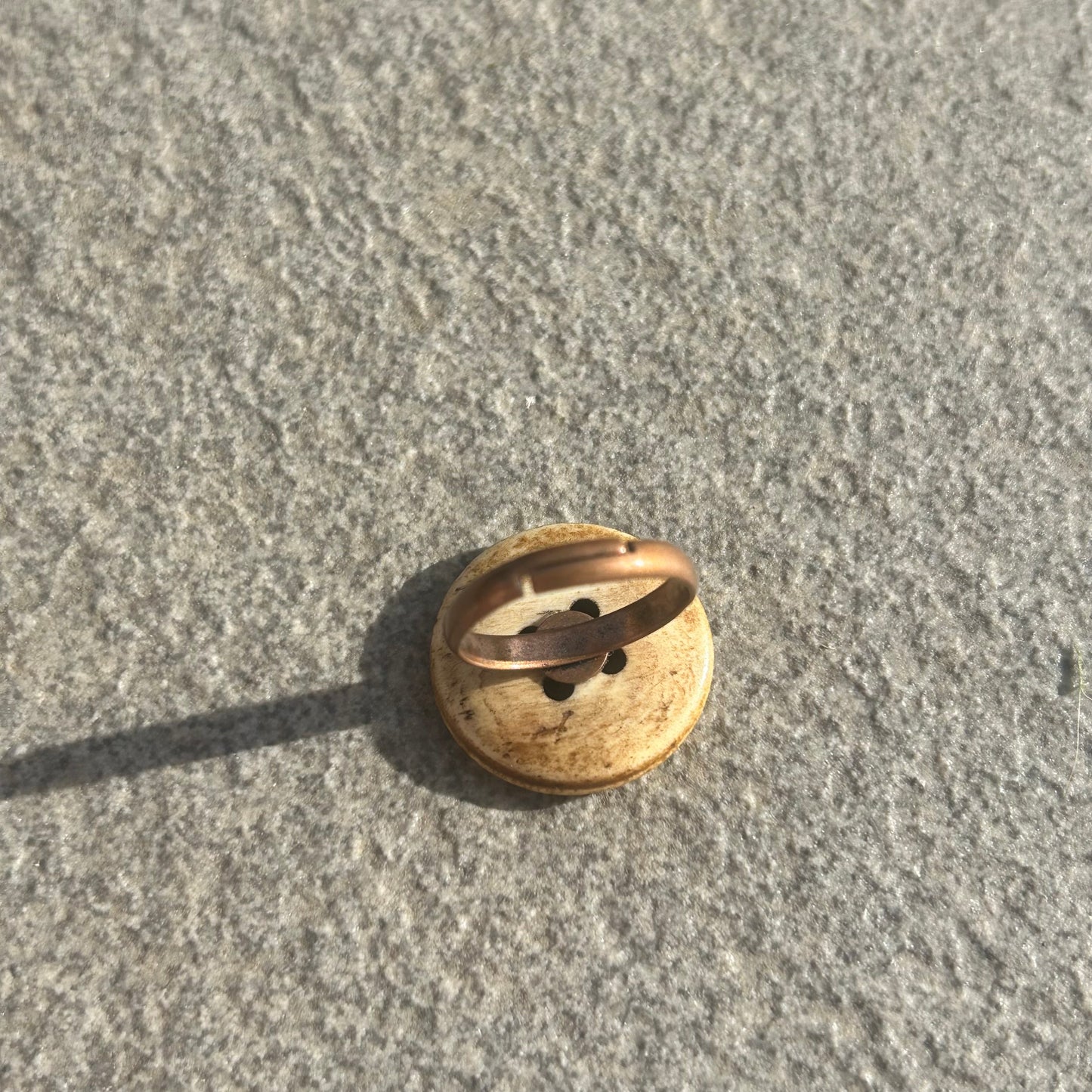 Brown button ring