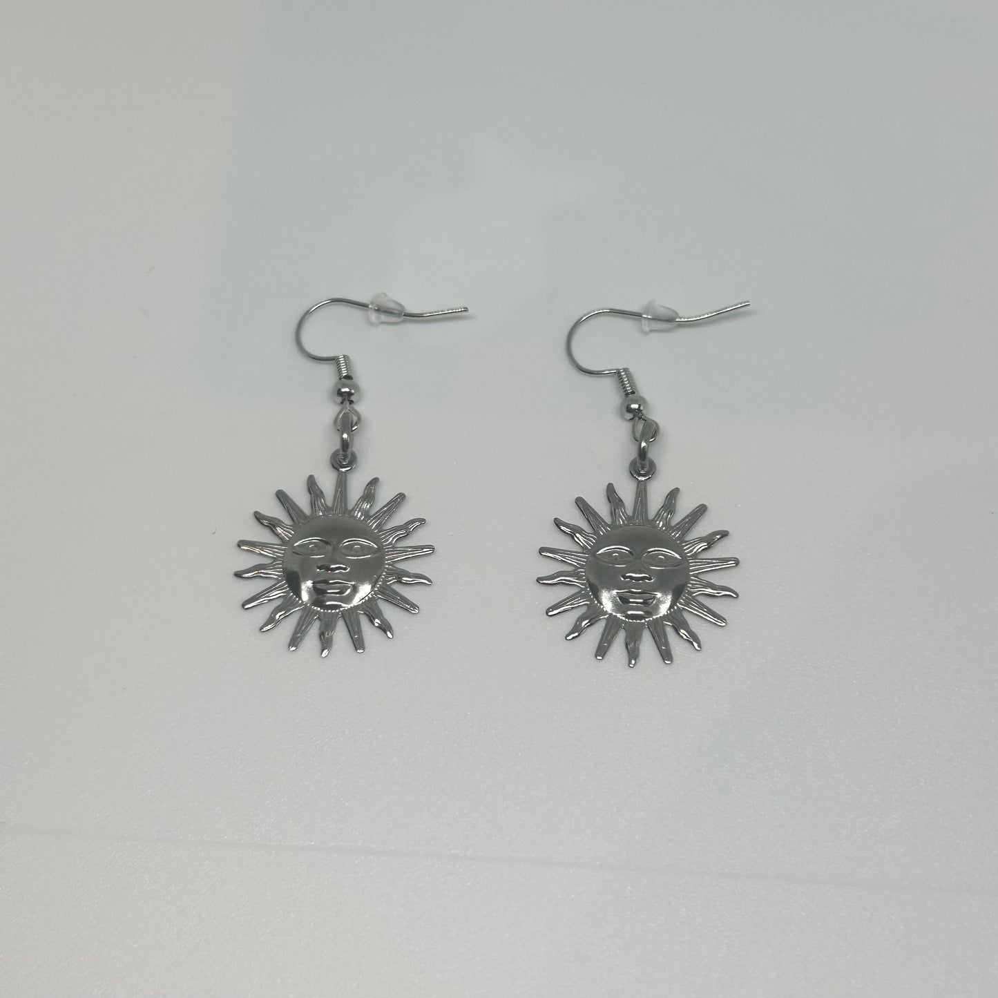 Stainless steel silver sun earrings