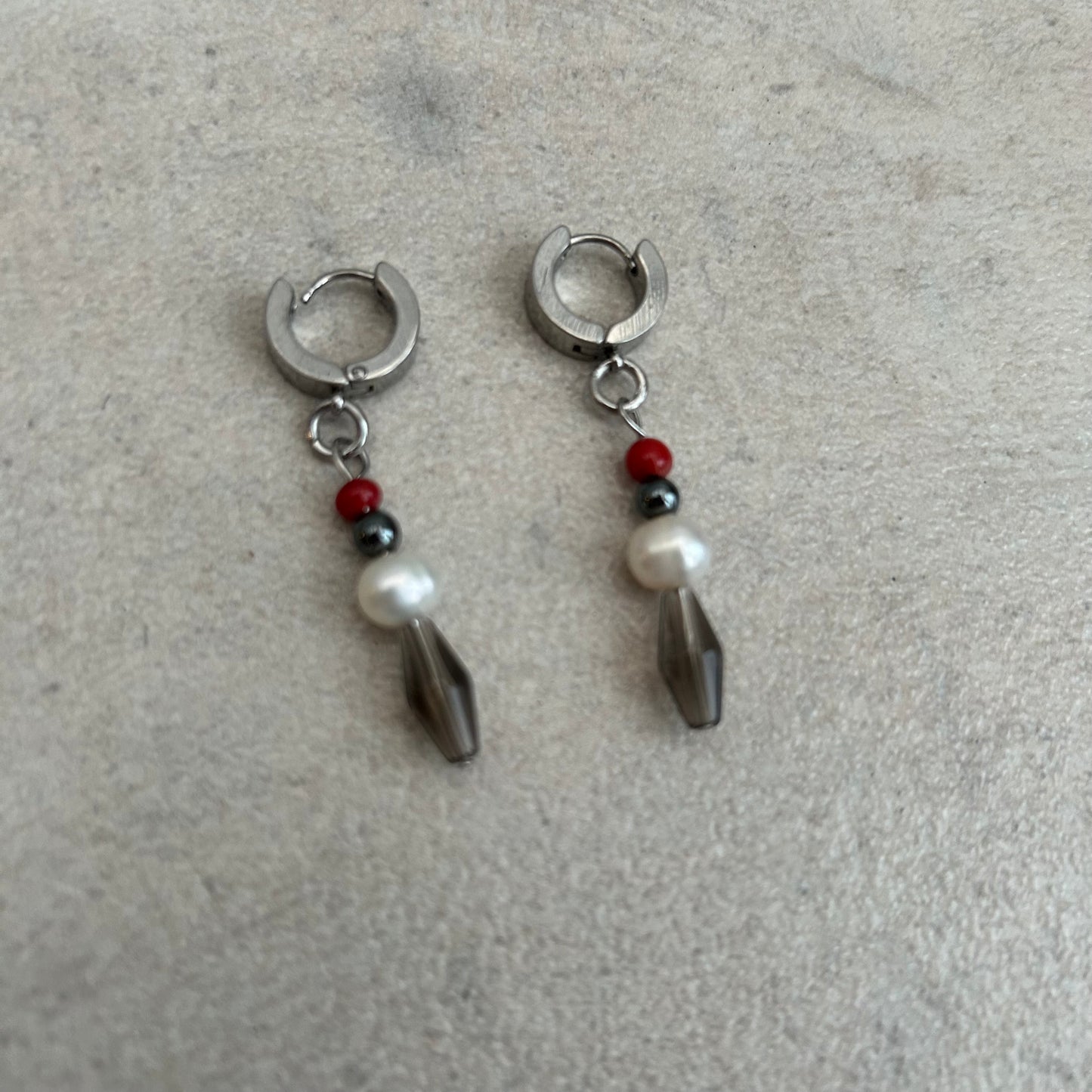 black white and red stainless steel huggie hoops