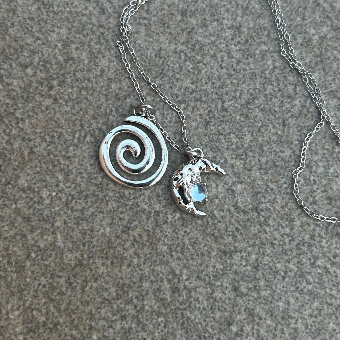 Crescent and spiral necklace