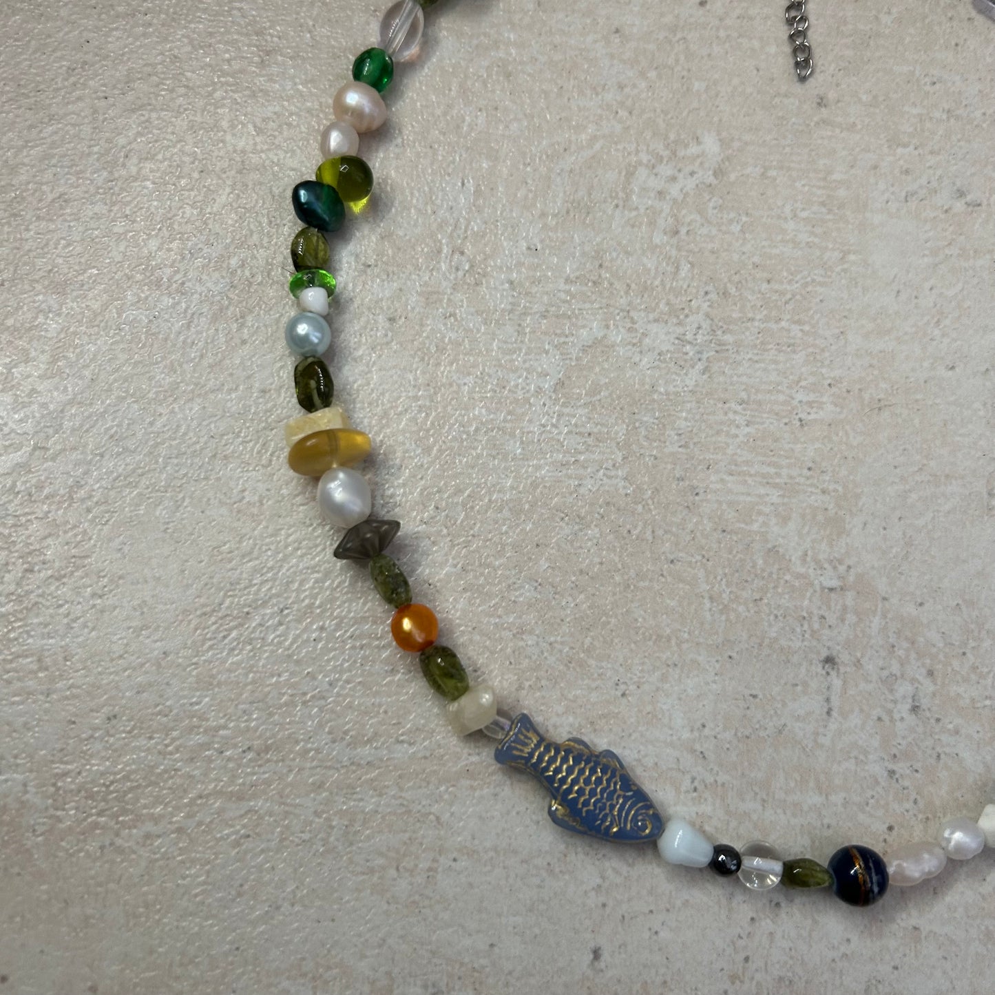 Gold on blue fish beaded necklace