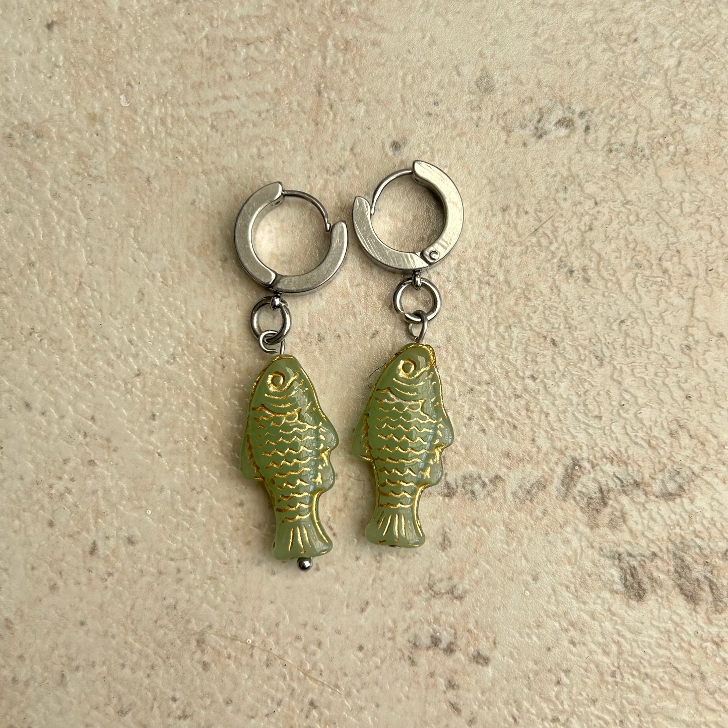 Gold on light green fish earrings