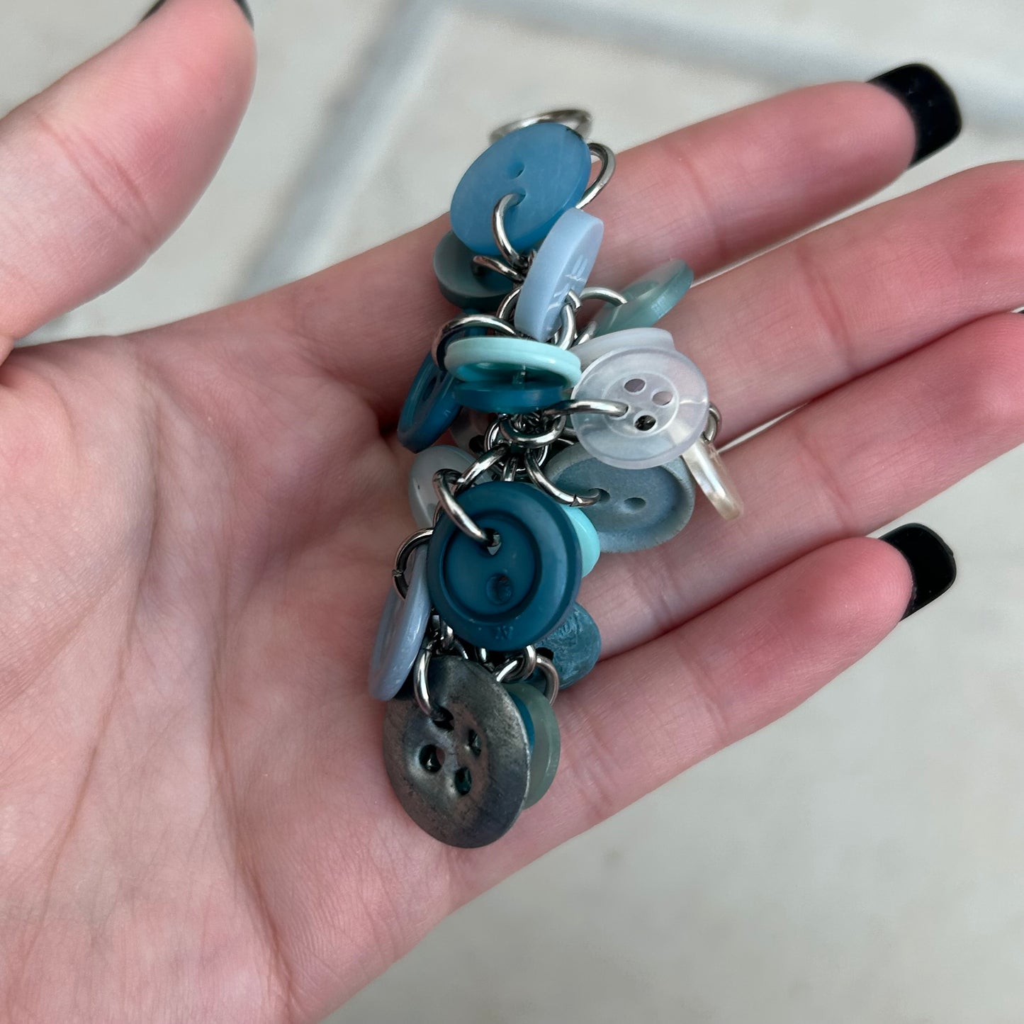 Blue button cluster keyring