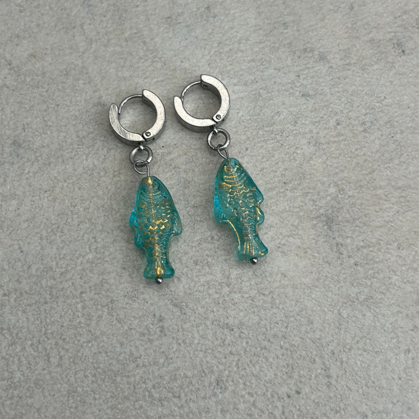 Gold on translucent light blue