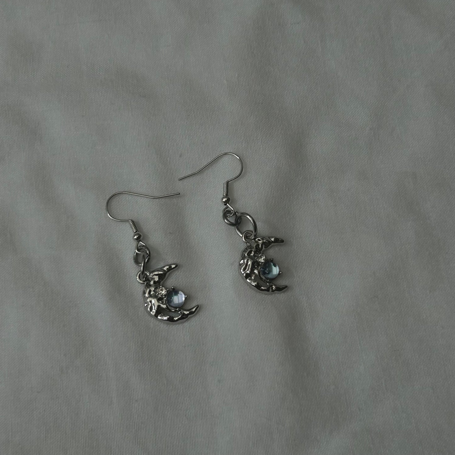Silver crescent moon earrings