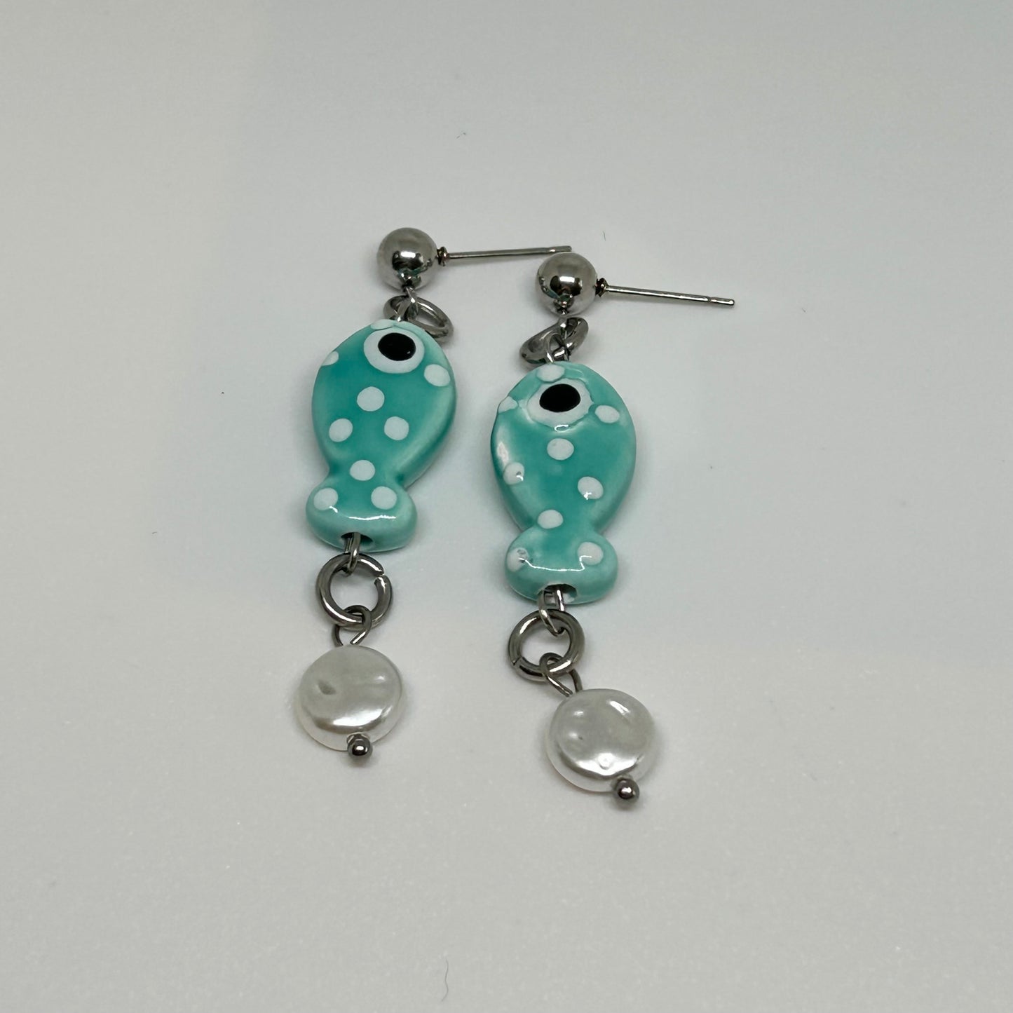 teal polka dot ceramic fish earrings