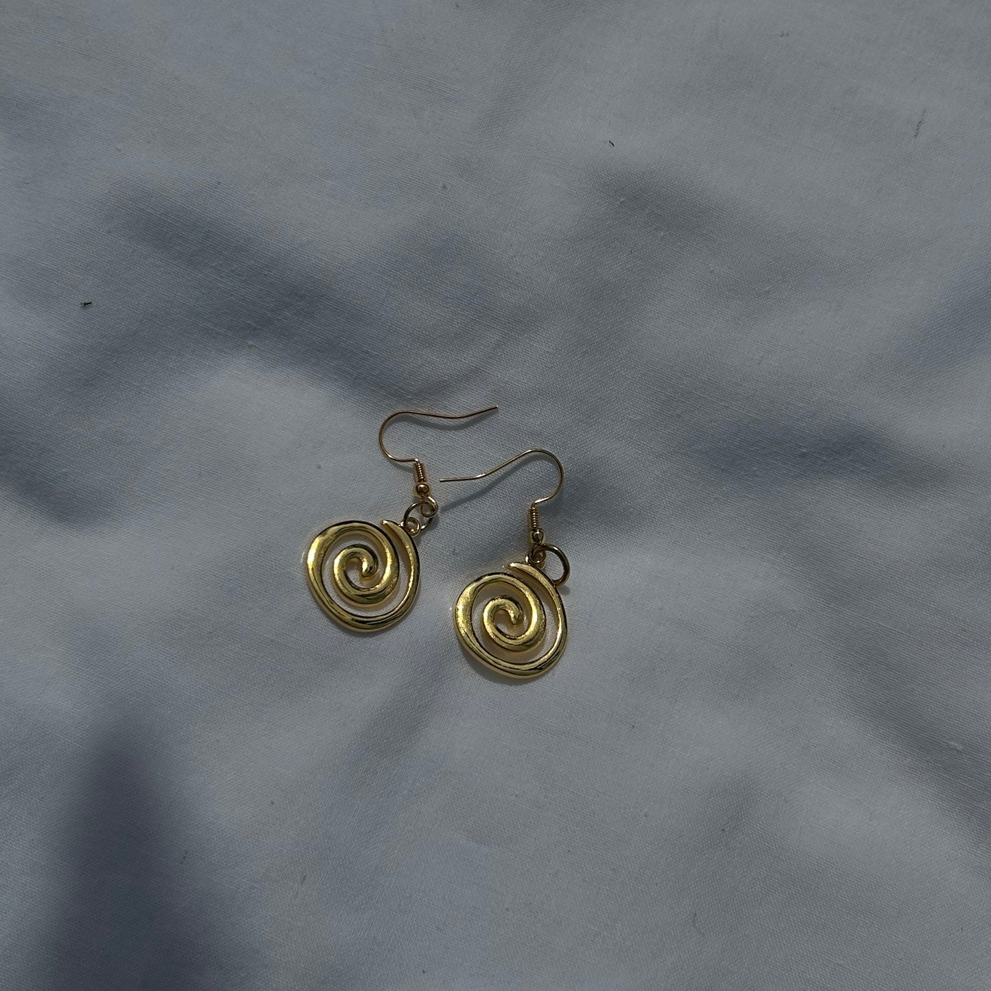 Gold spirals earrings