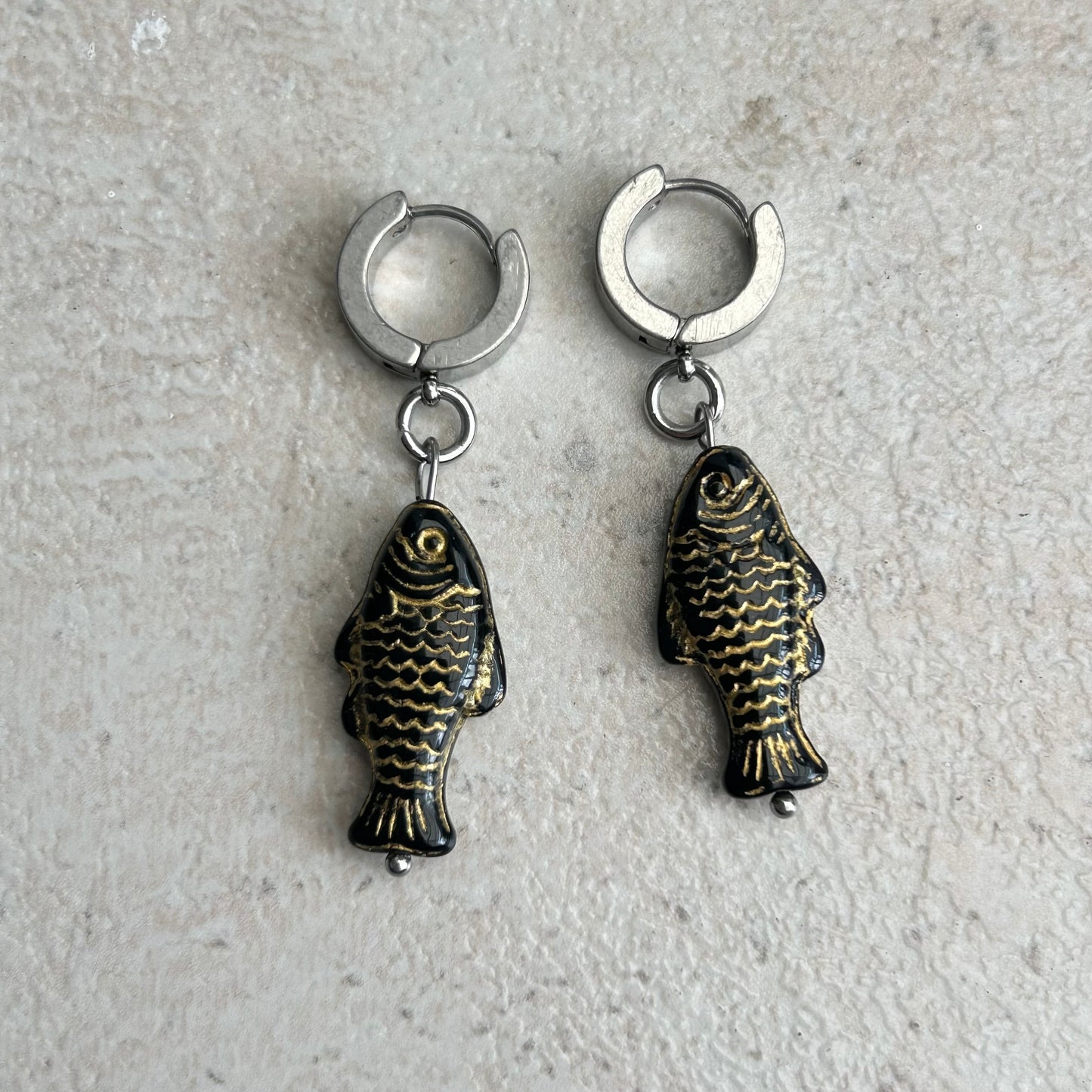 Gold on black fish earrings