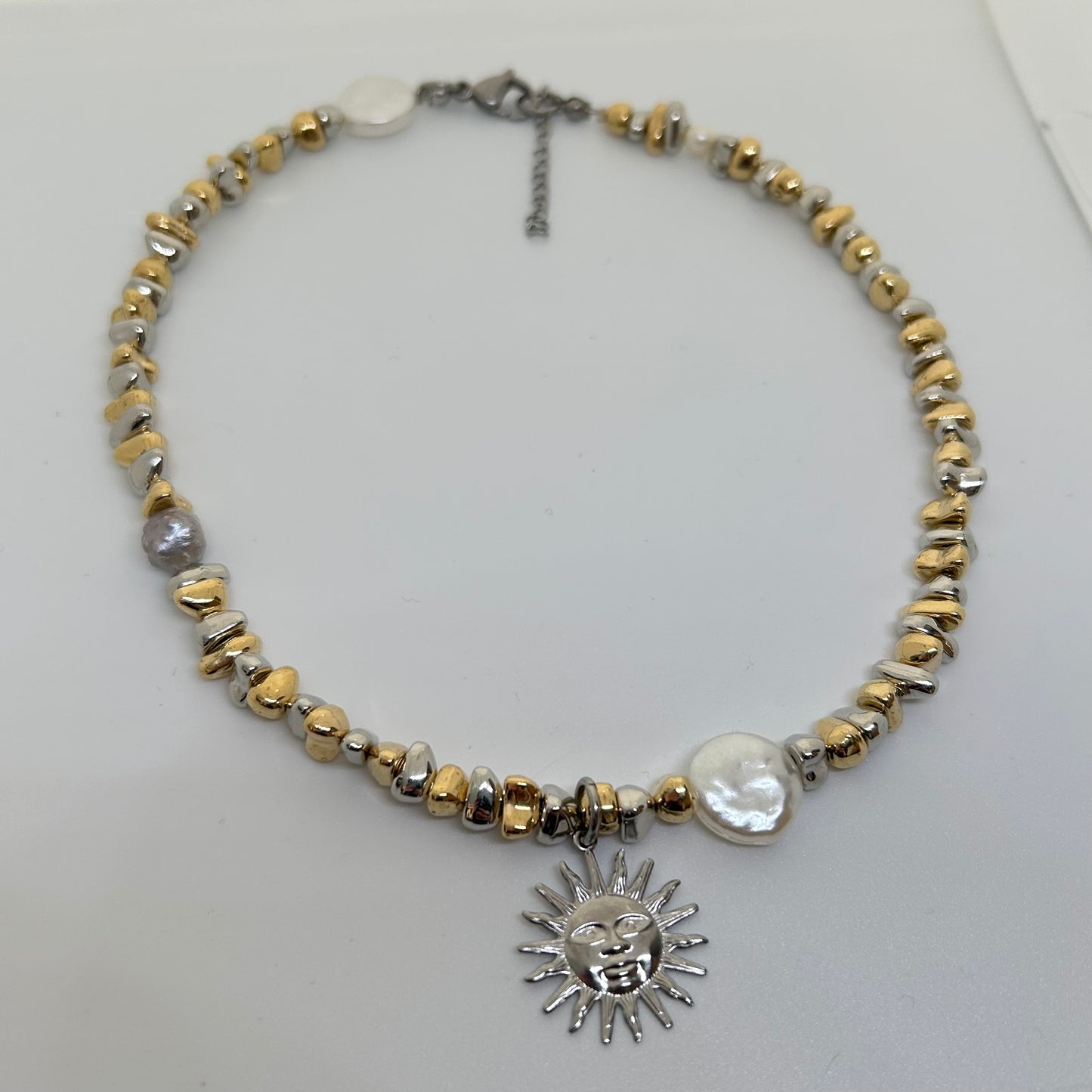 Silver sun mixed metal necklace