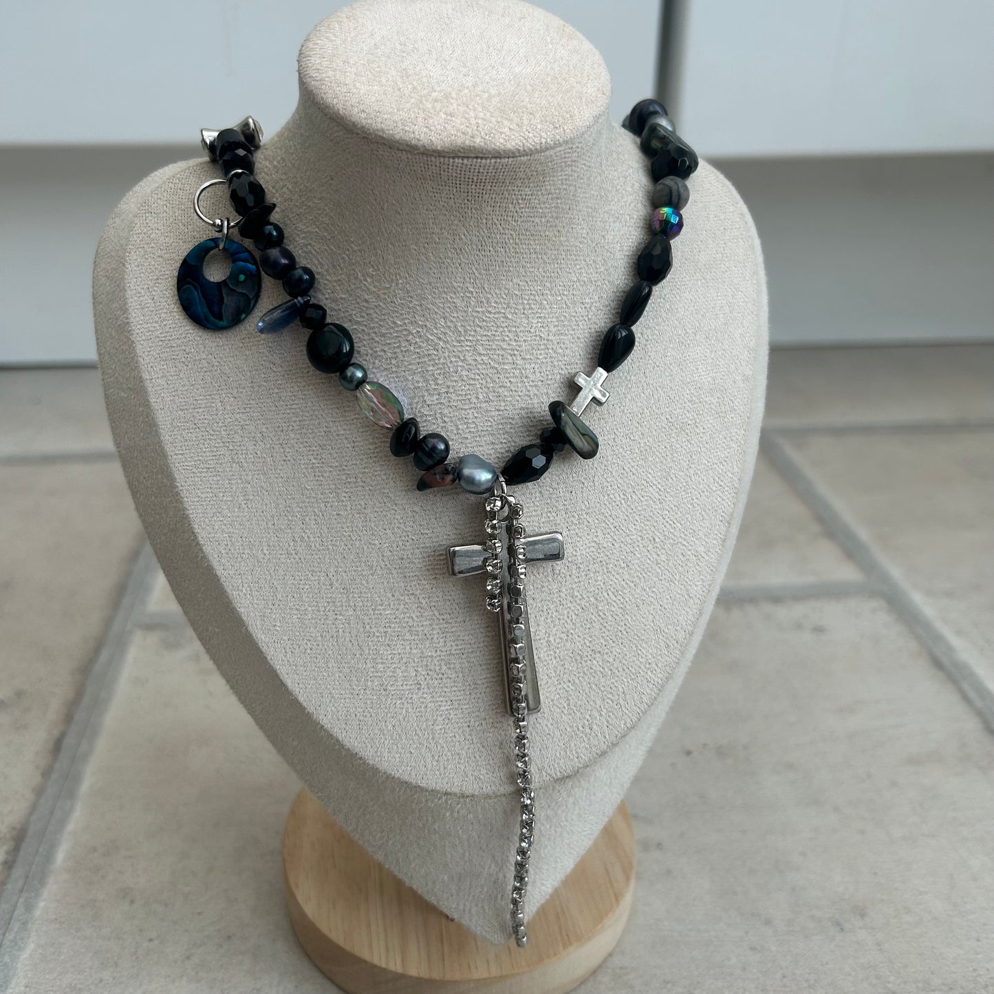 Pearly black cross necklace