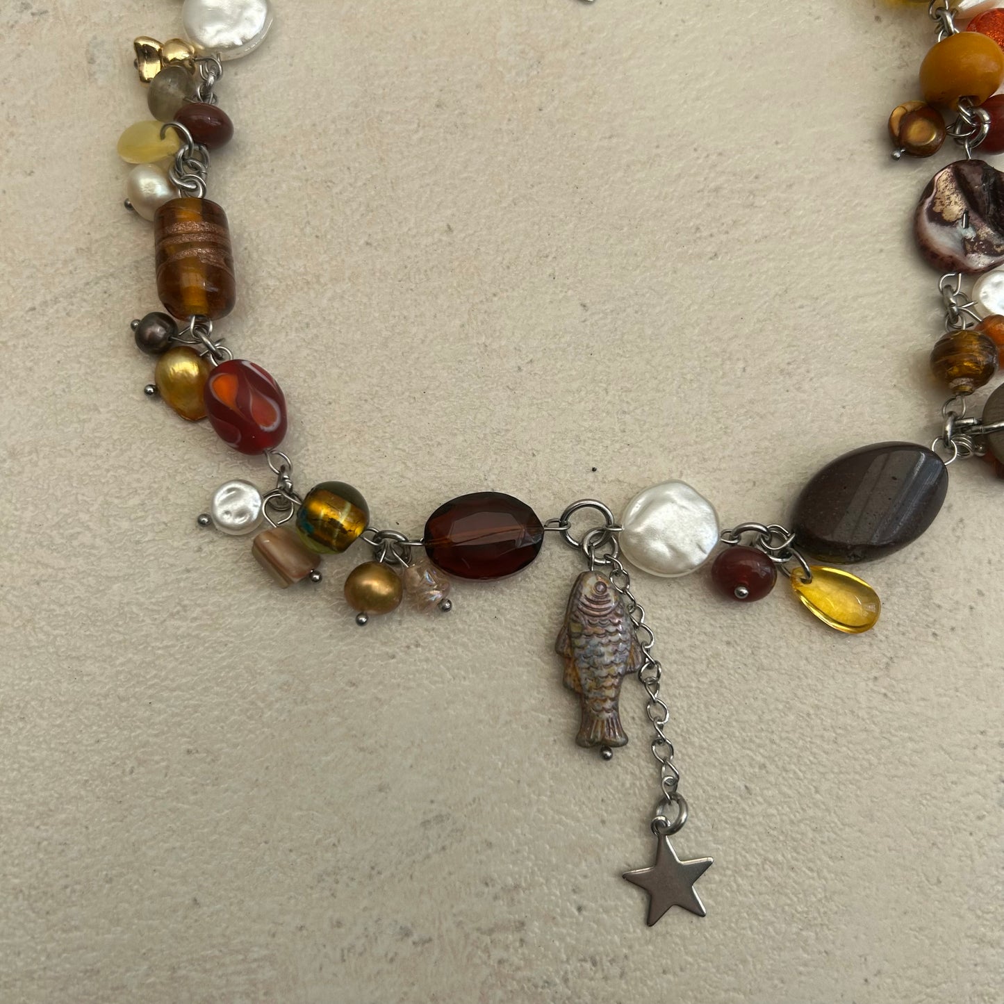 Brown fish cluster necklace