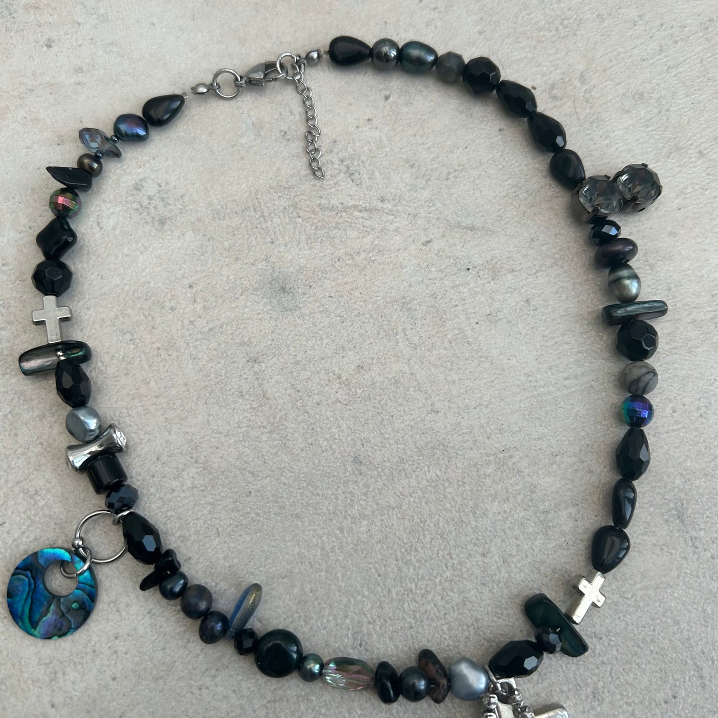 Pearly black cross necklace