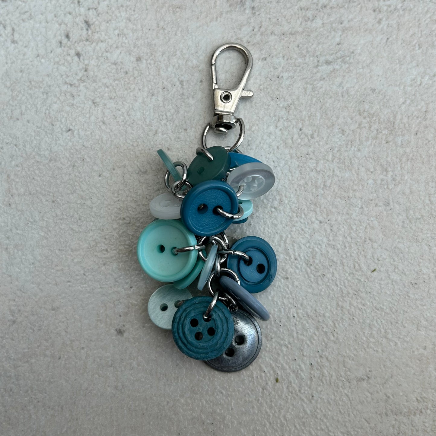 Blue button cluster keyring