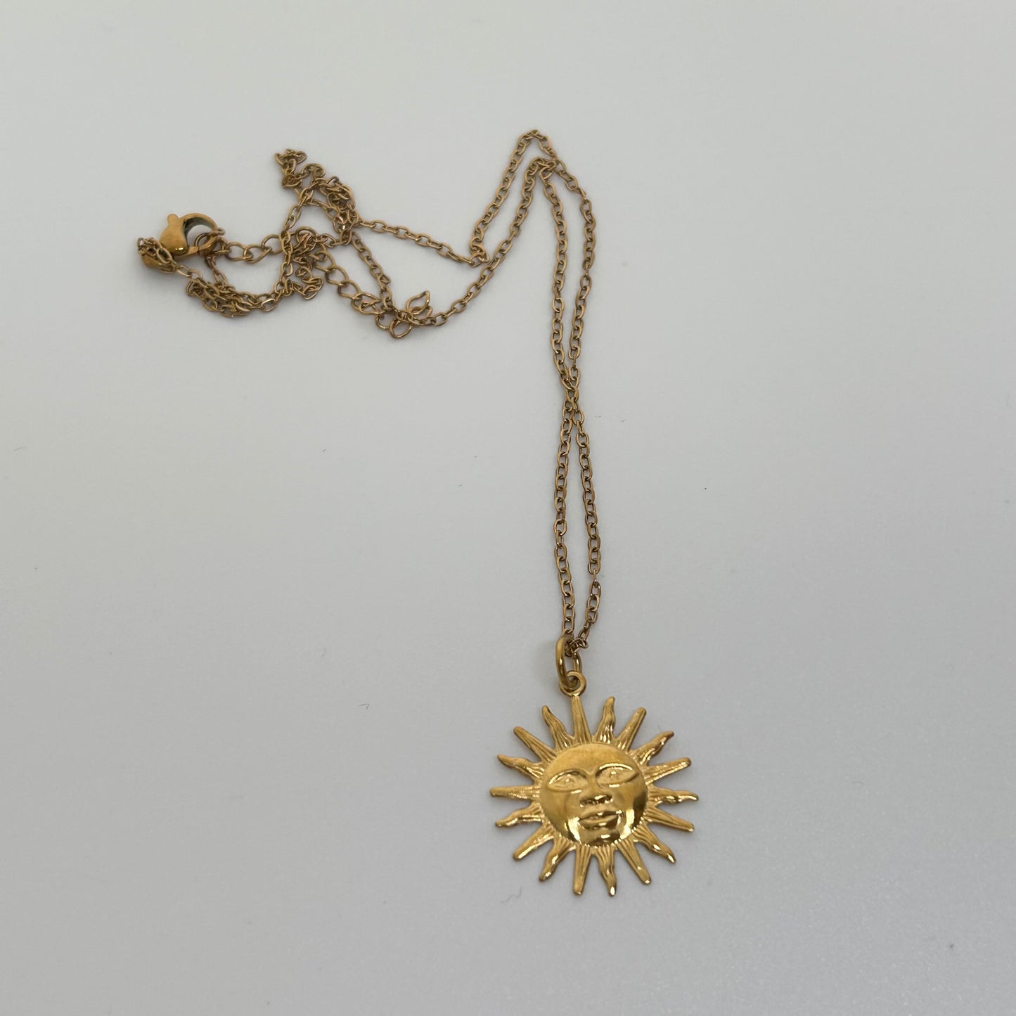Gold sun stainless steel necklace
