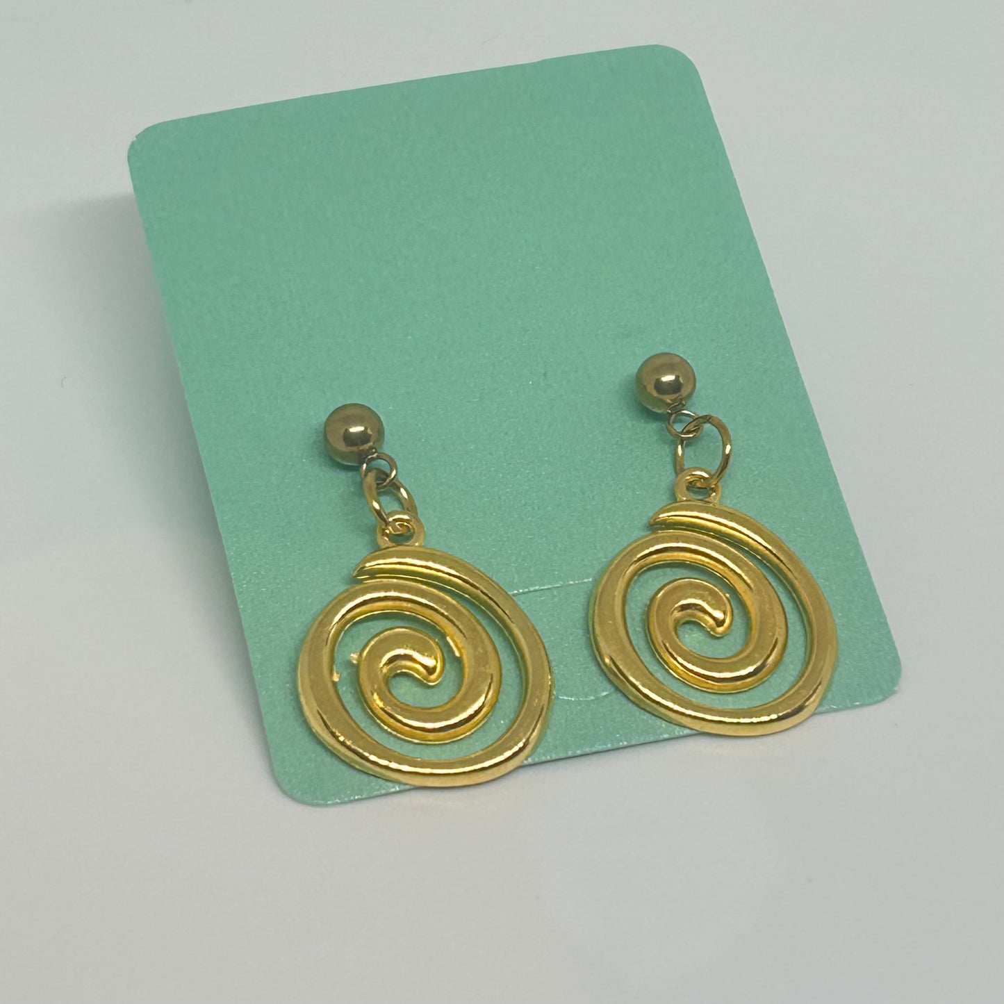 Gold stud swirl earrings