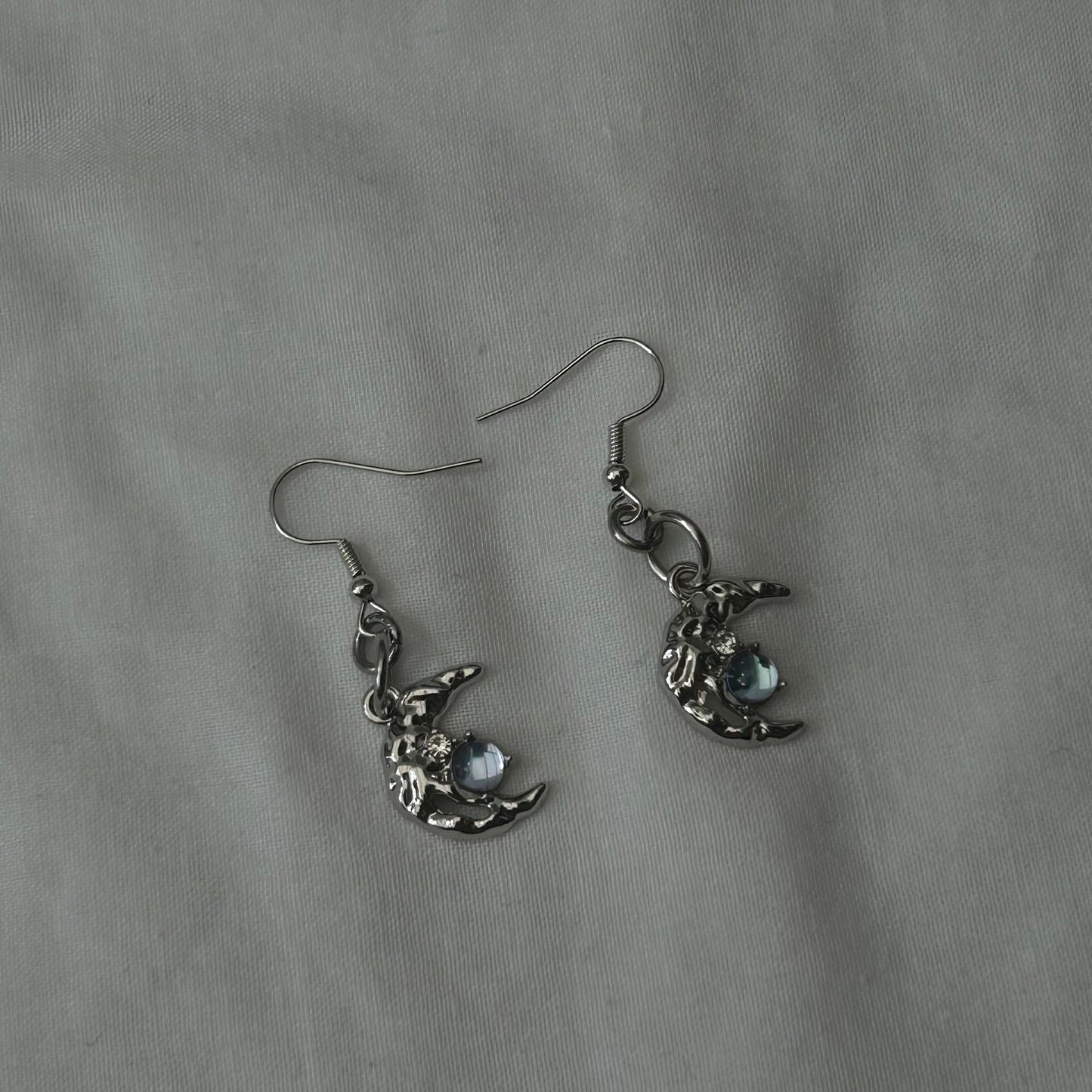 Silver crescent moon earrings