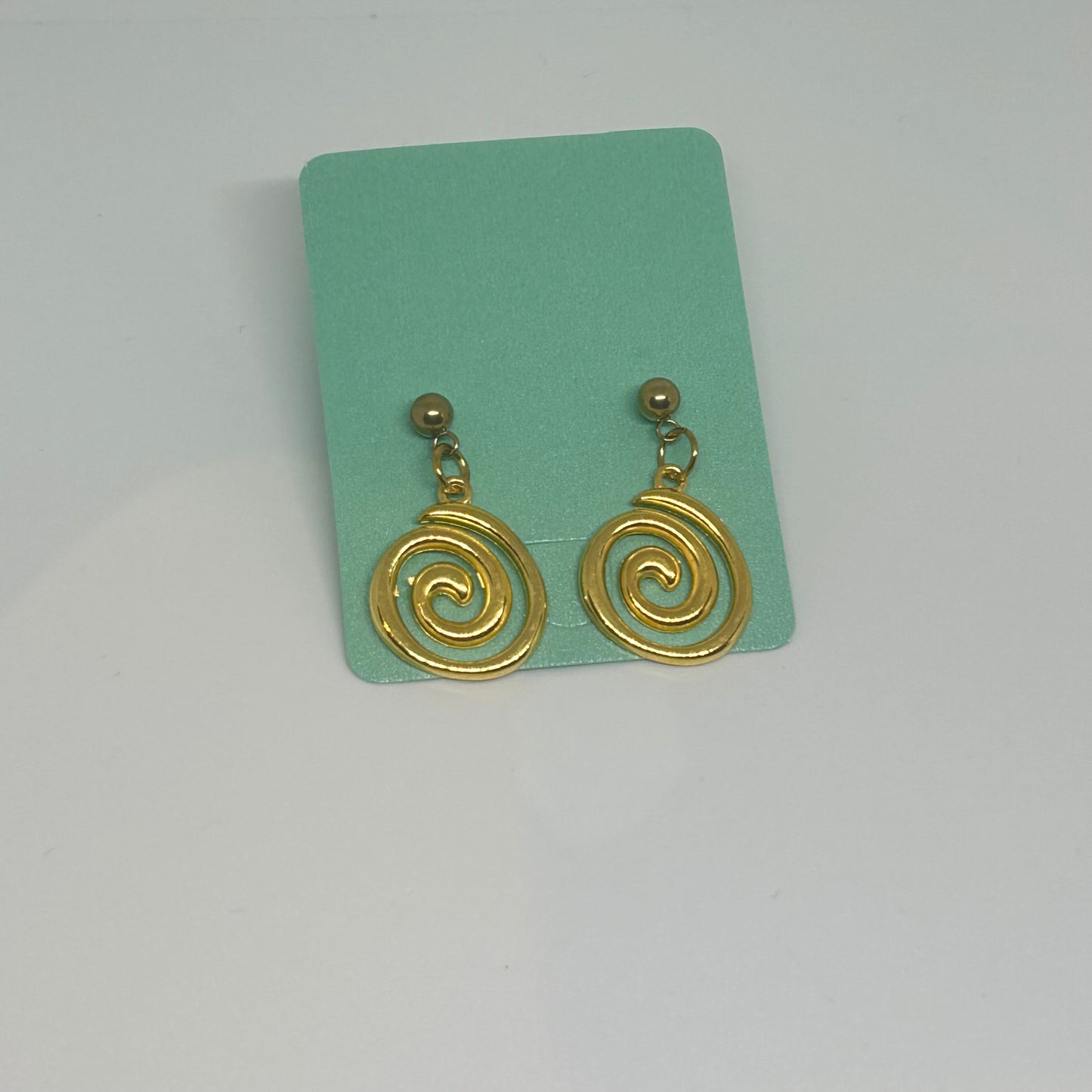 Gold stud swirl earrings