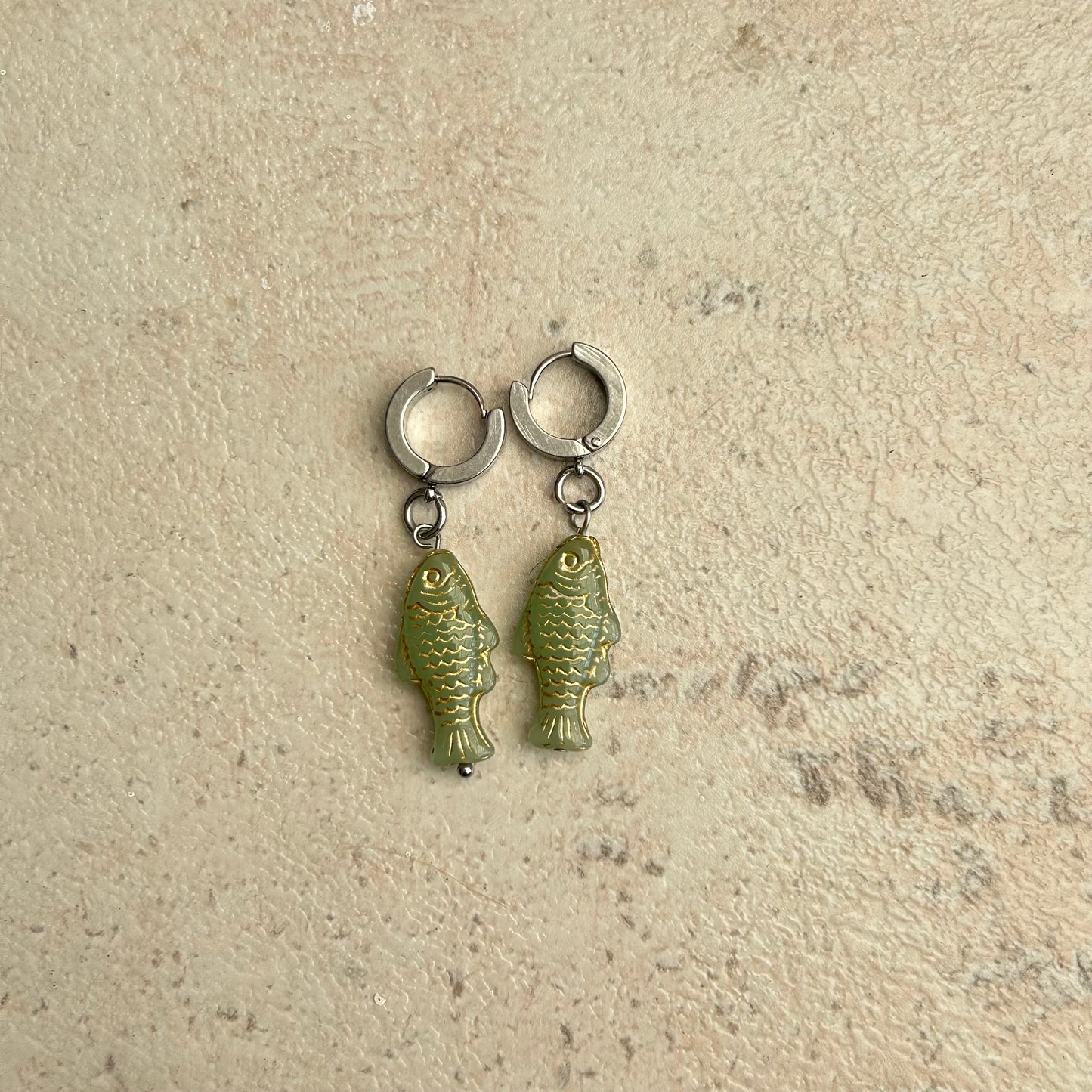 Gold on light green fish earrings