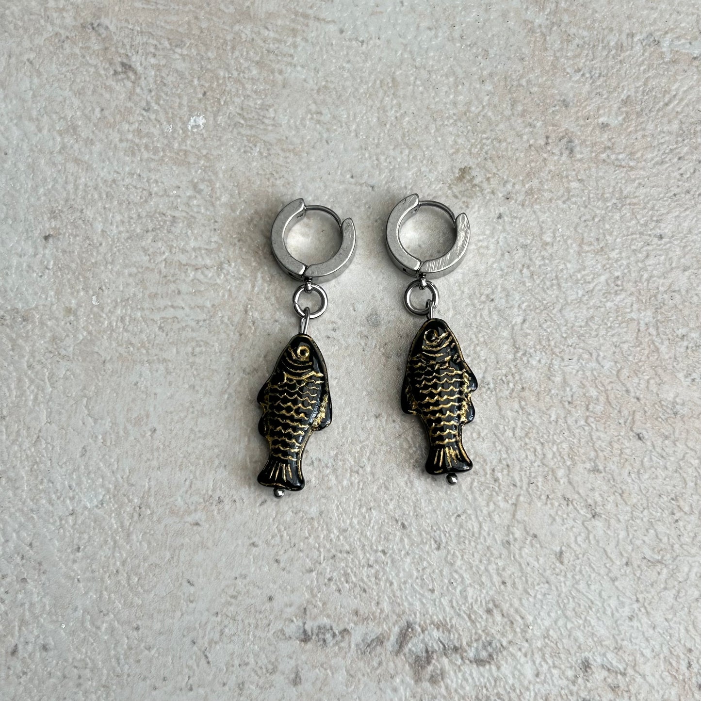 Gold on black fish earrings