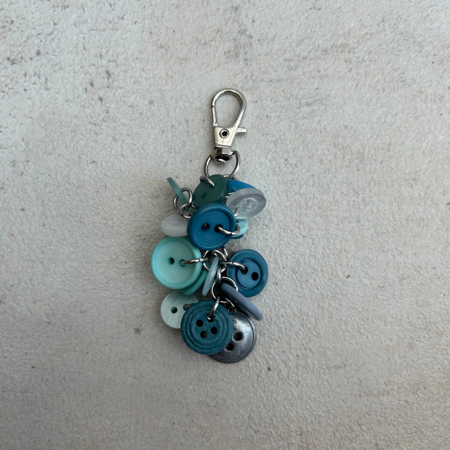 Blue button cluster keyring