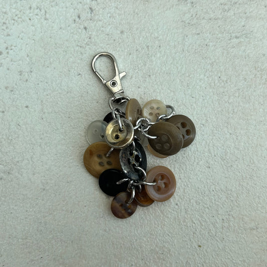 Brown button cluster keyring