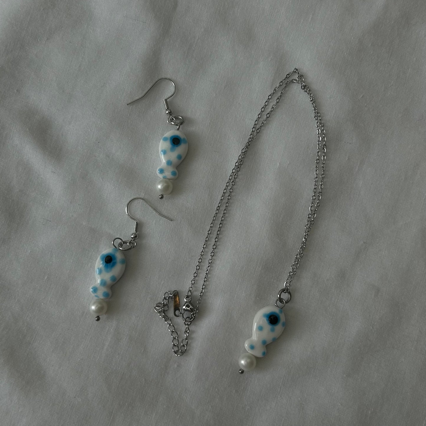 White and blue polka dot fish set