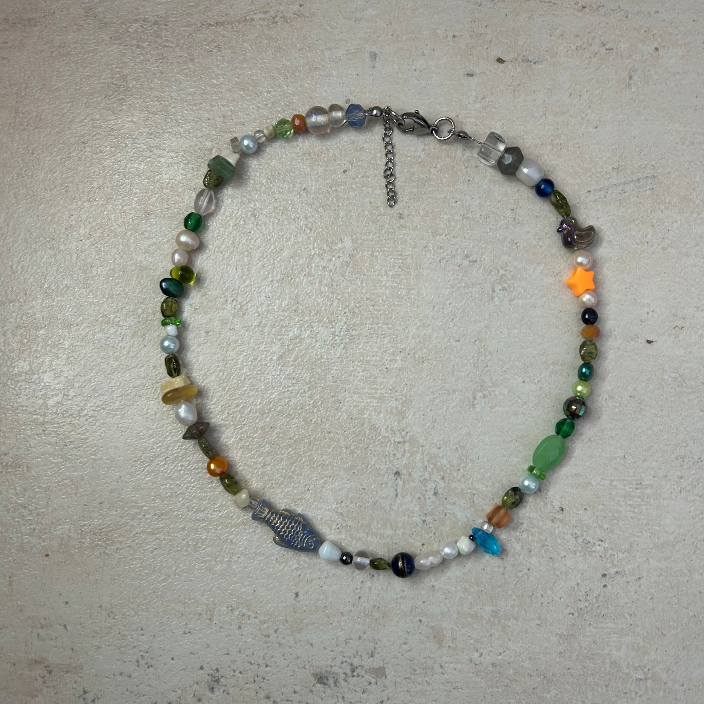 Gold on blue fish beaded necklace