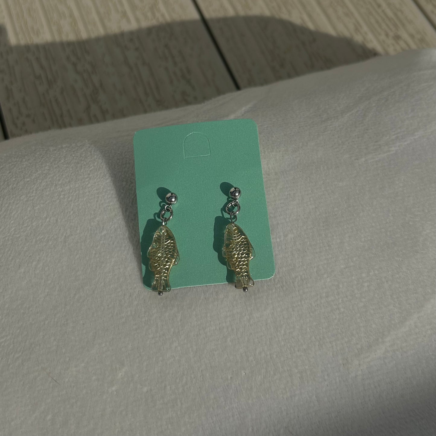 Gold on clear fish studs
