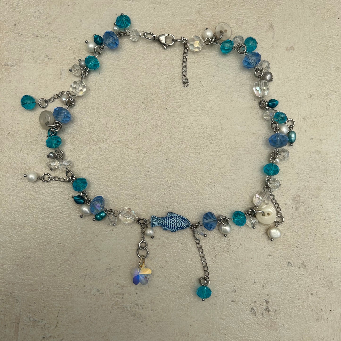Blue fish necklace