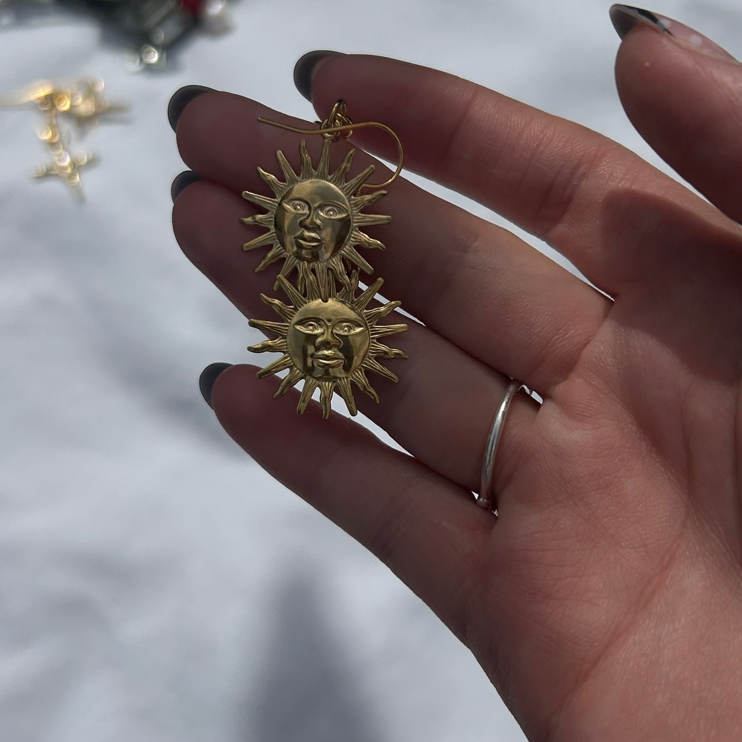 Gold sun earrings