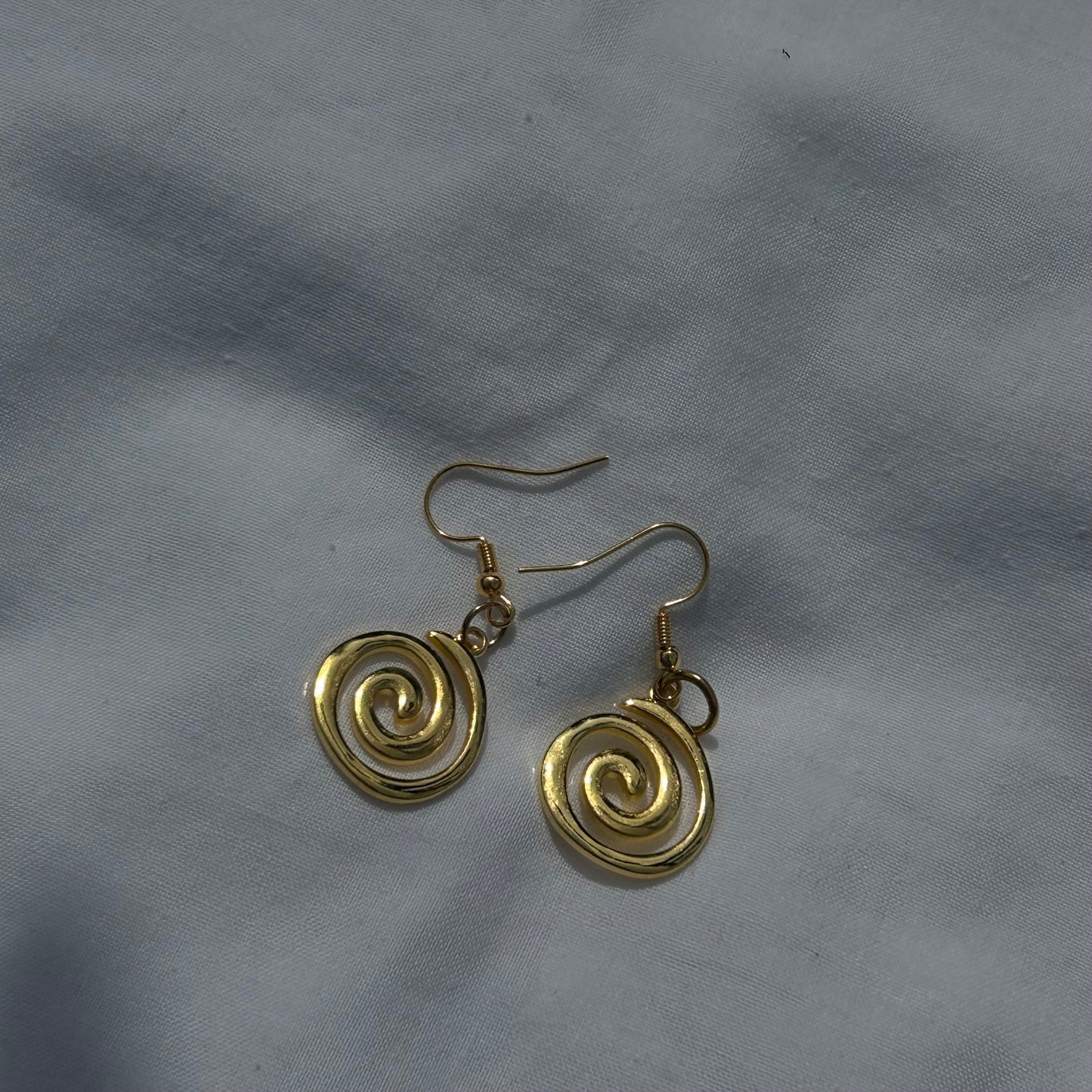 Gold spirals earrings
