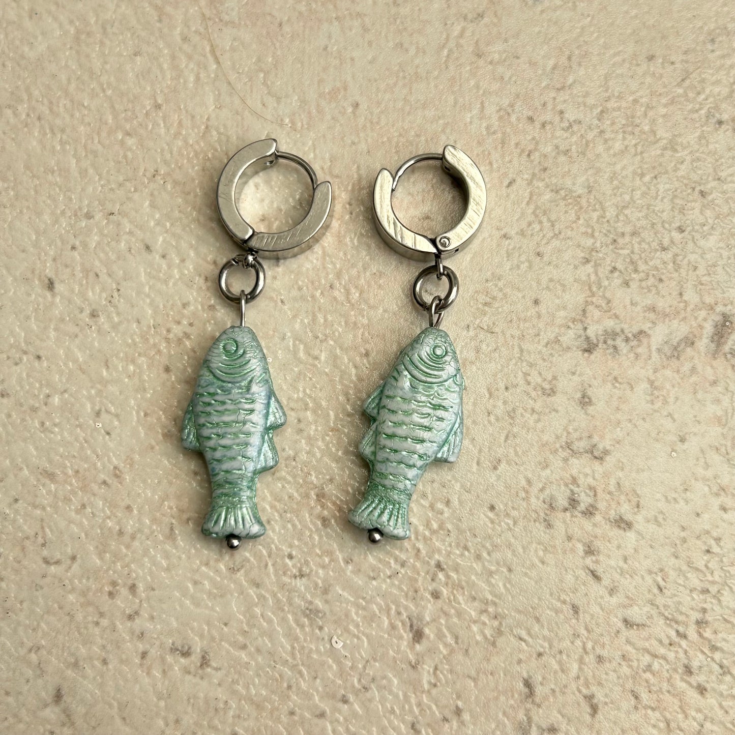 Teal fish earrings