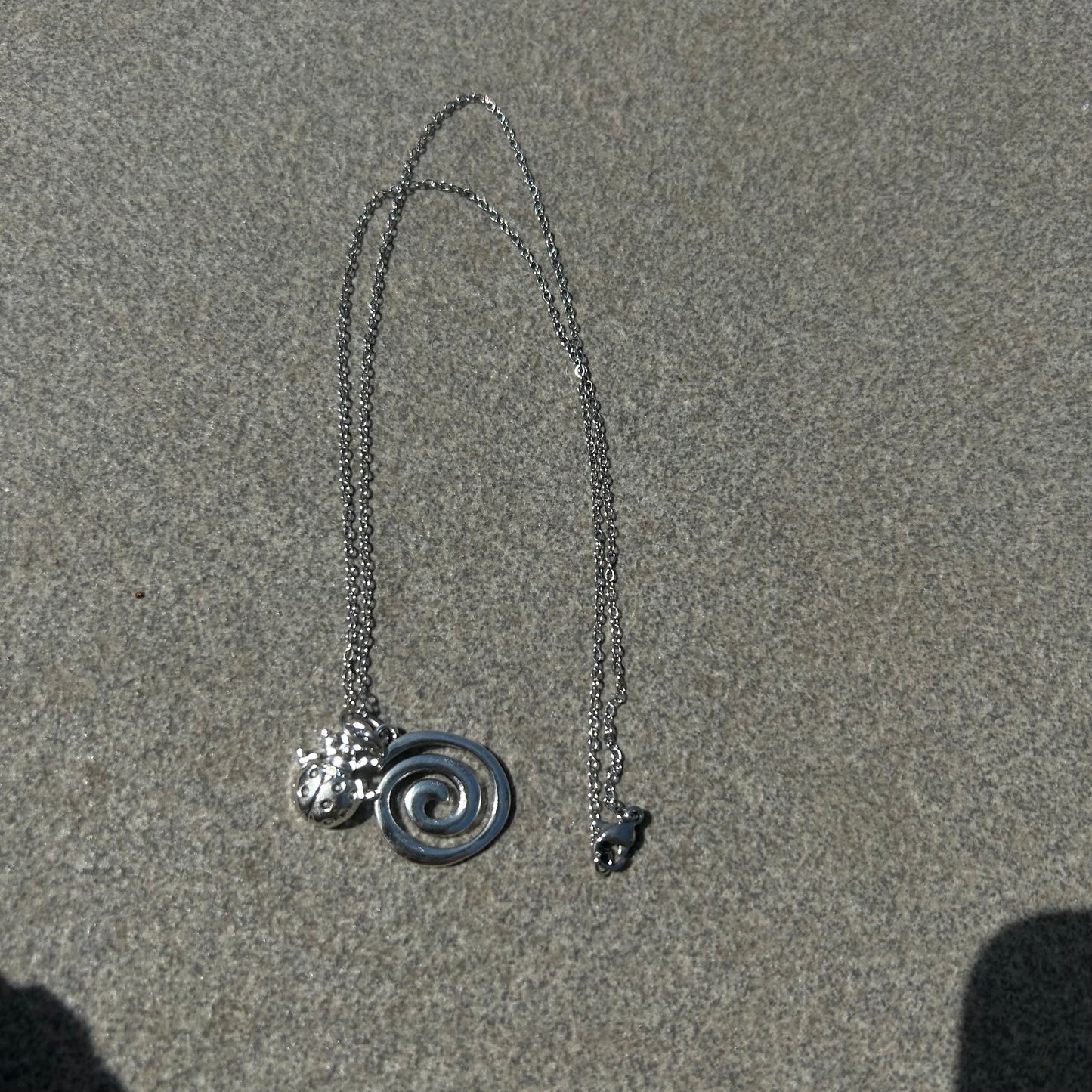 Spiral charm necklace