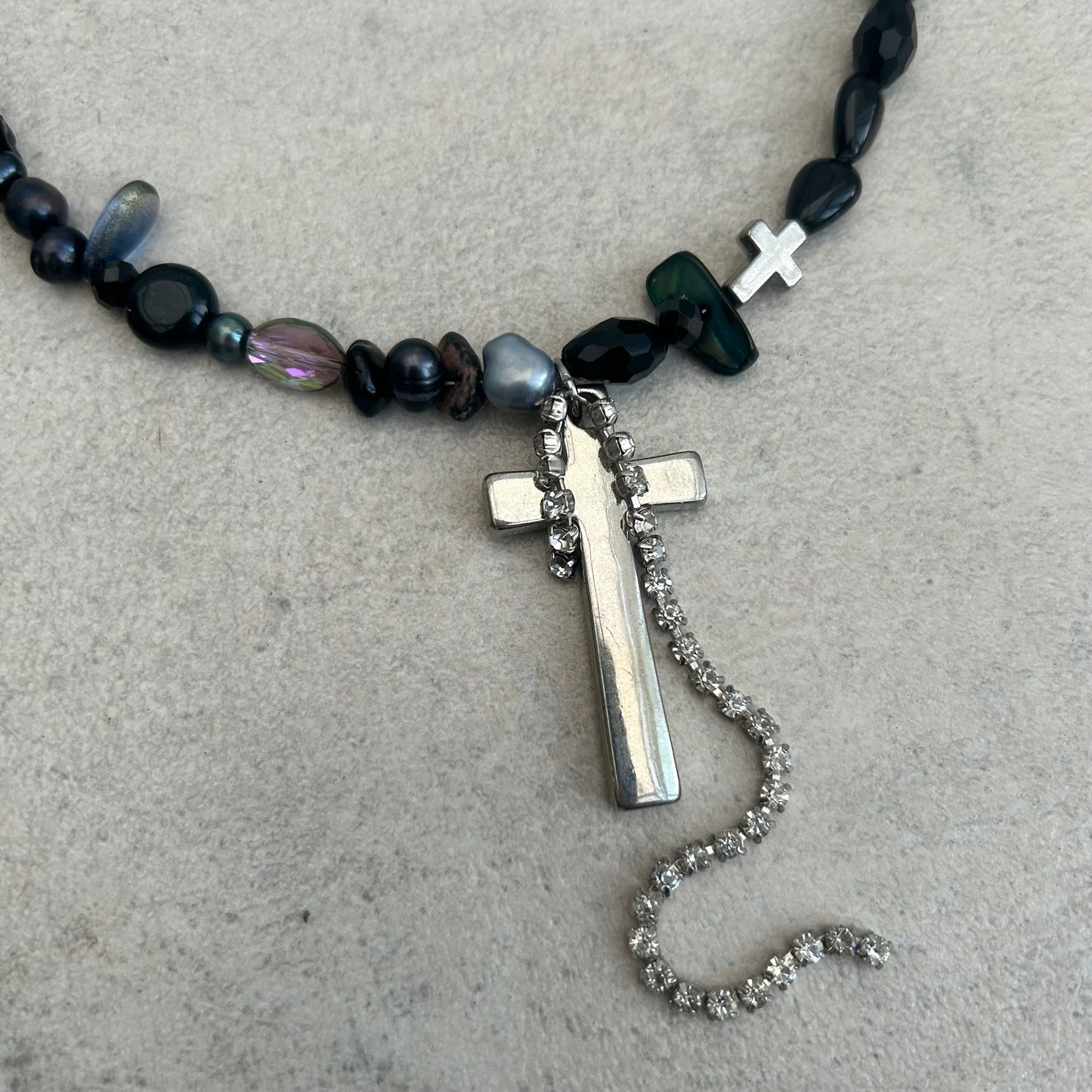 Pearly black cross necklace