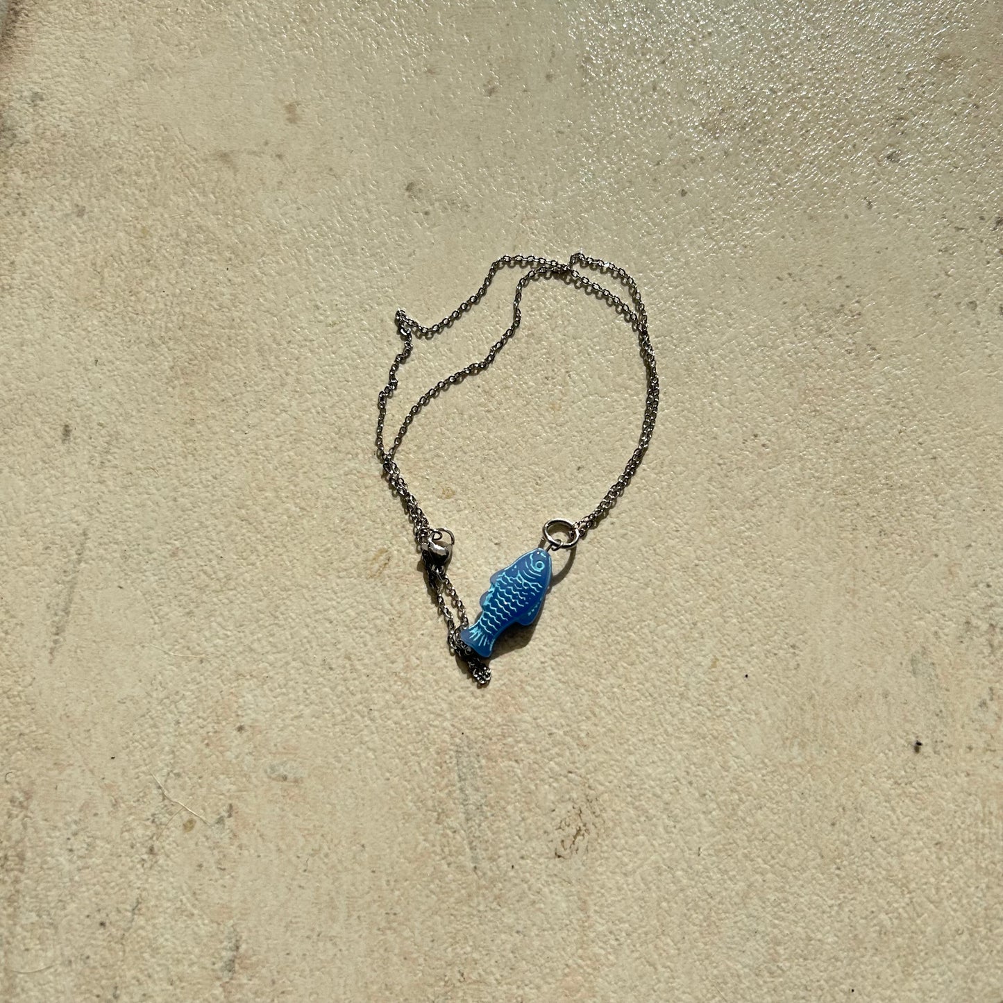 Light blue on blue fish necklace