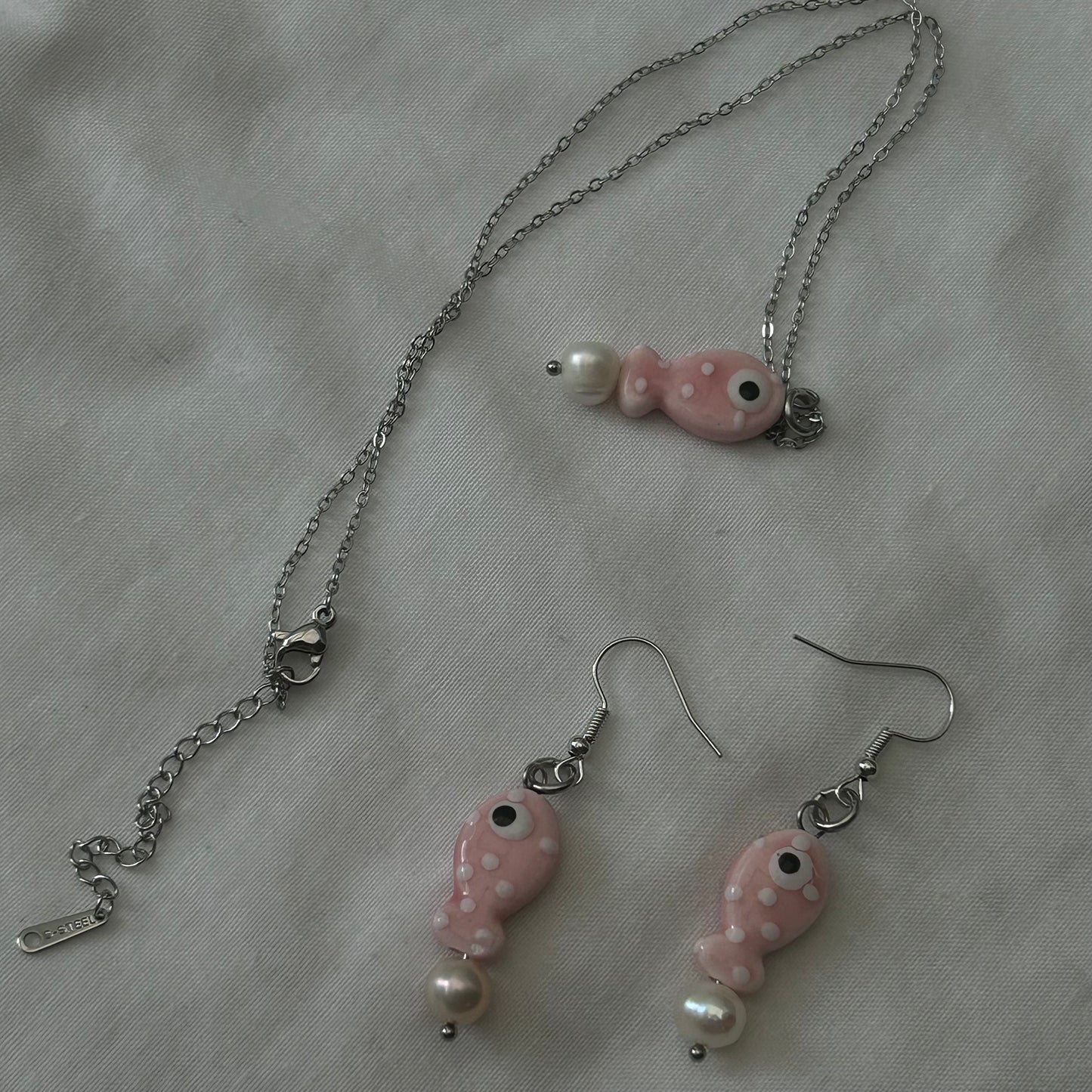 Pink ceramic polka dot fish set
