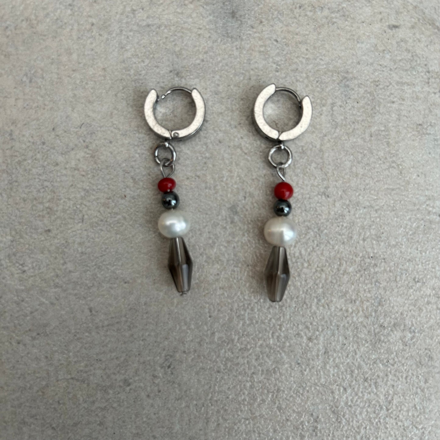 black white and red stainless steel huggie hoops