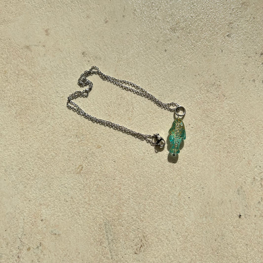 Transparent blue and gold fish necklace