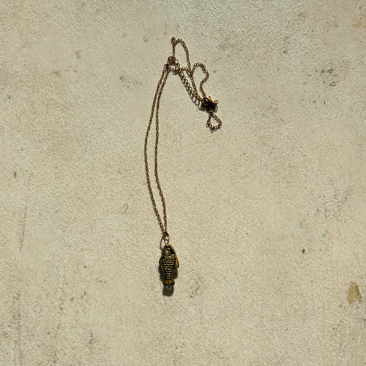 Gold on dark blue fish necklace