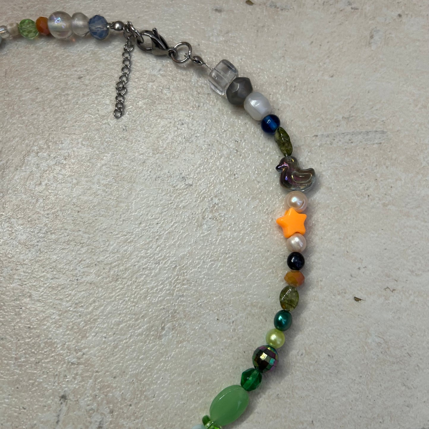 Gold on blue fish beaded necklace