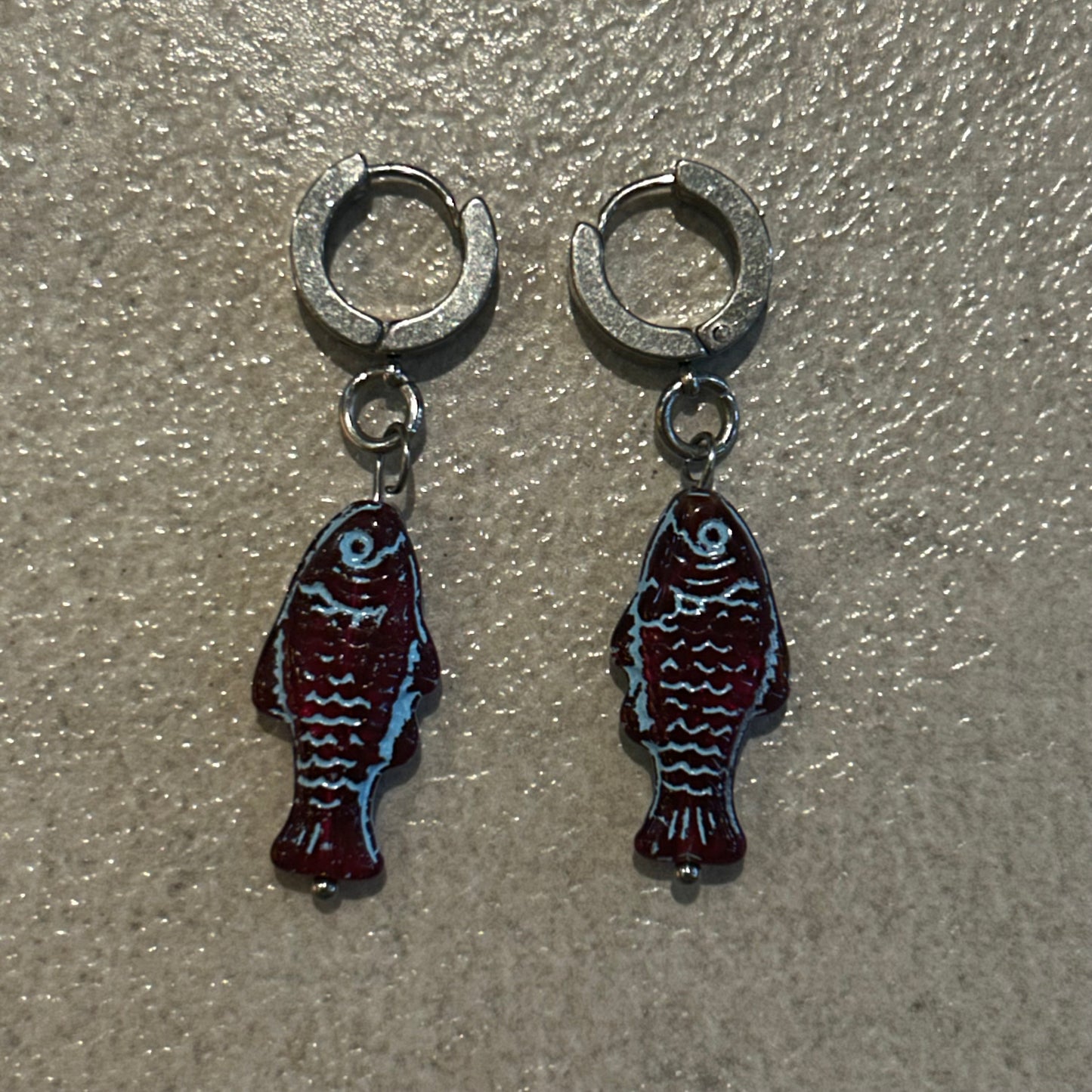 Blue on burgundy fish earrings