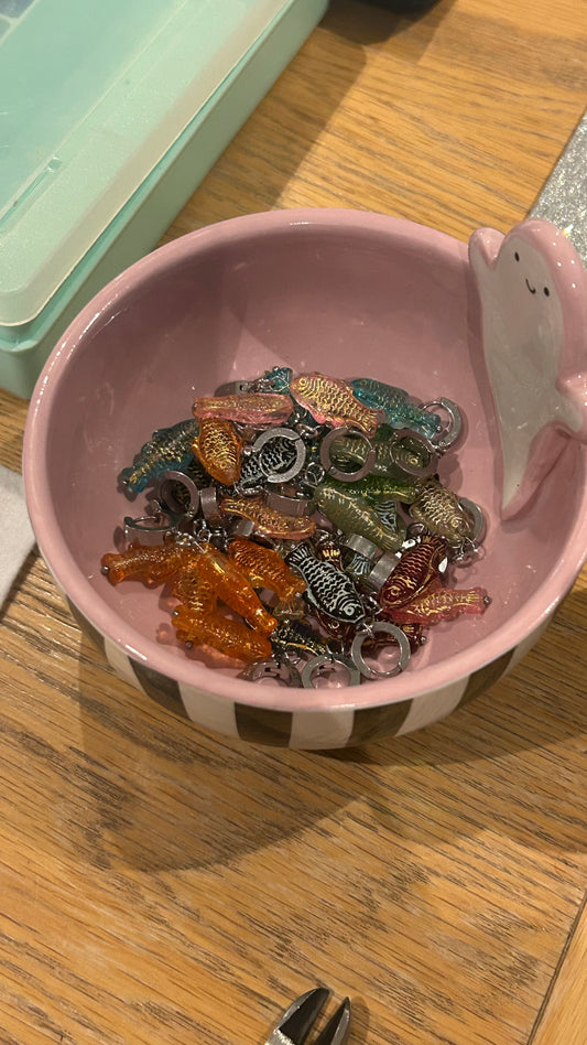 Mystery pair of stainless steel fish earrings