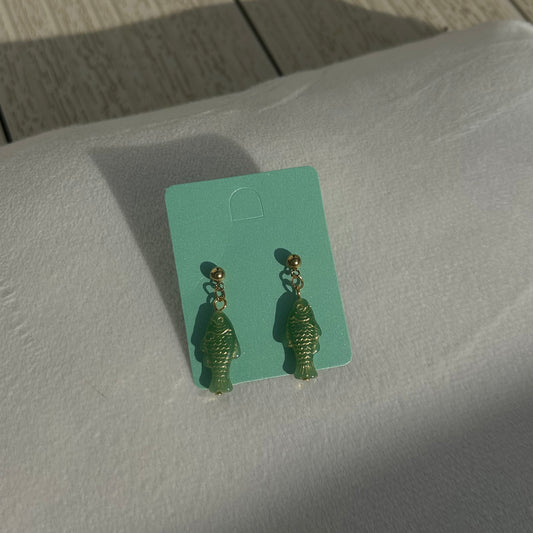 Gold on green fish studs