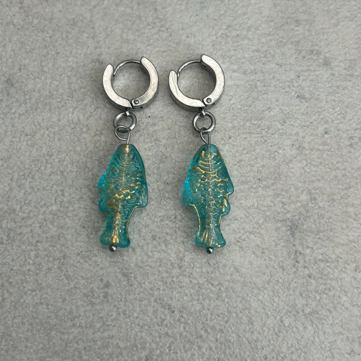 Gold on translucent light blue