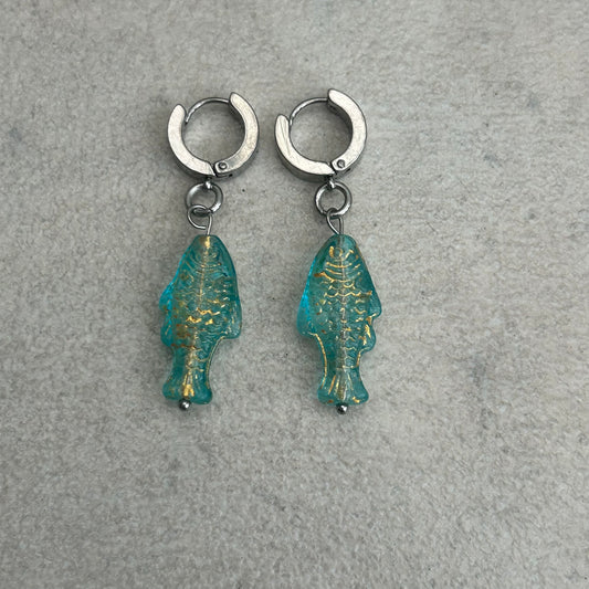 Gold on translucent light blue