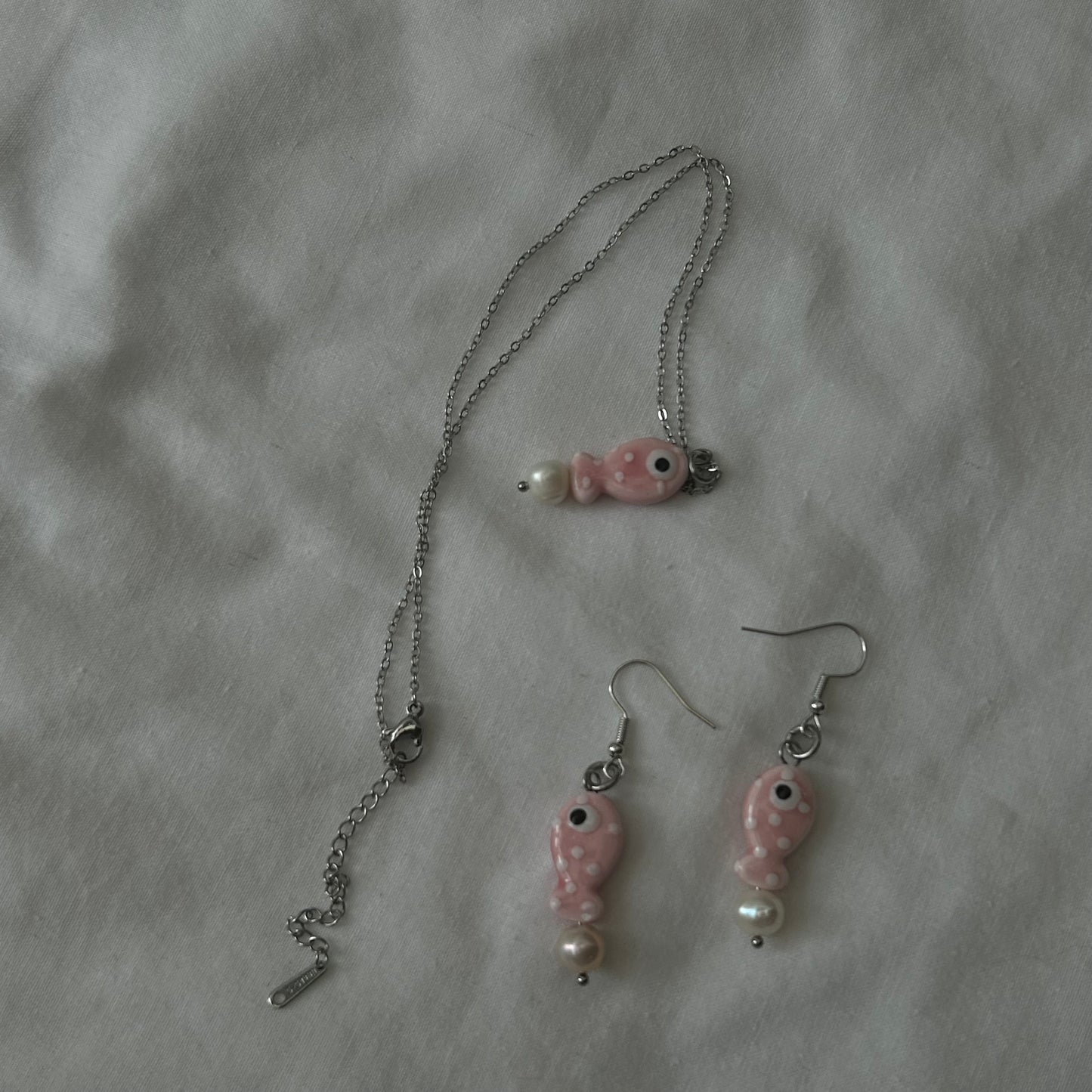 Pink ceramic polka dot fish set