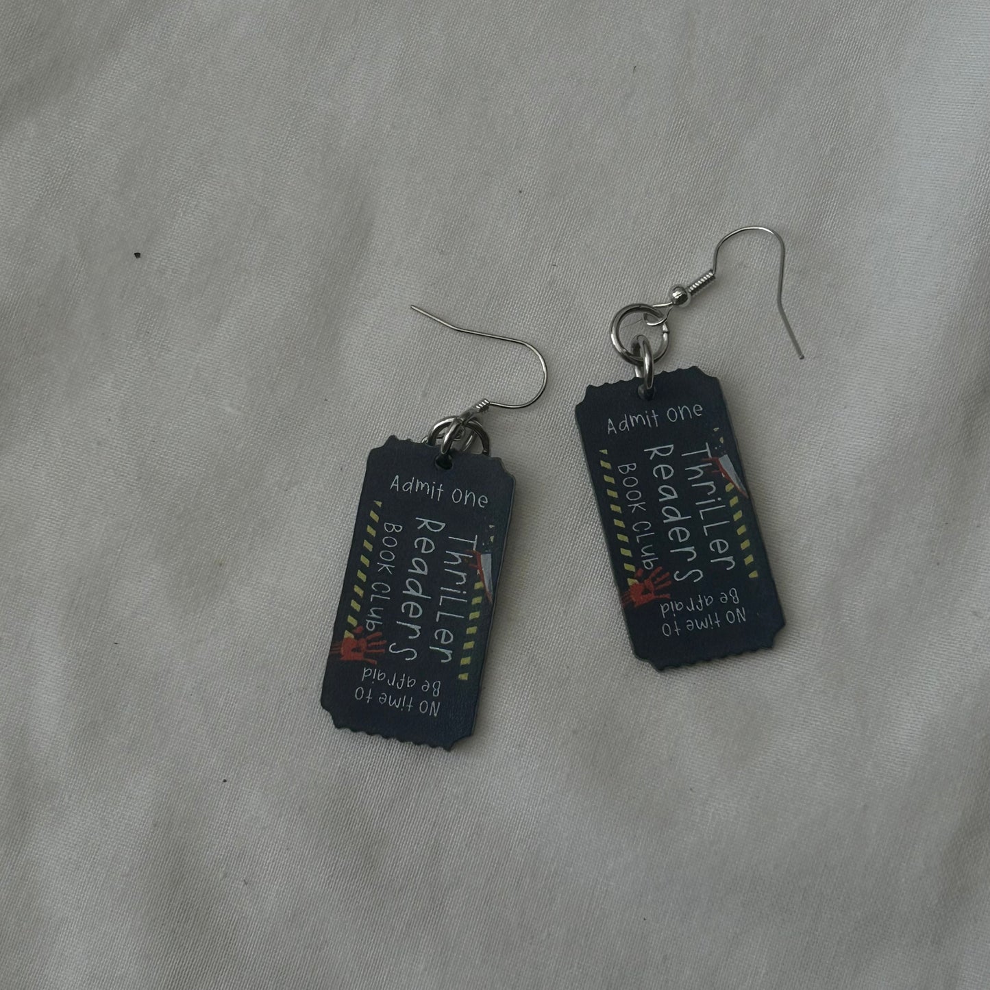Thriller cinema ticket earrings