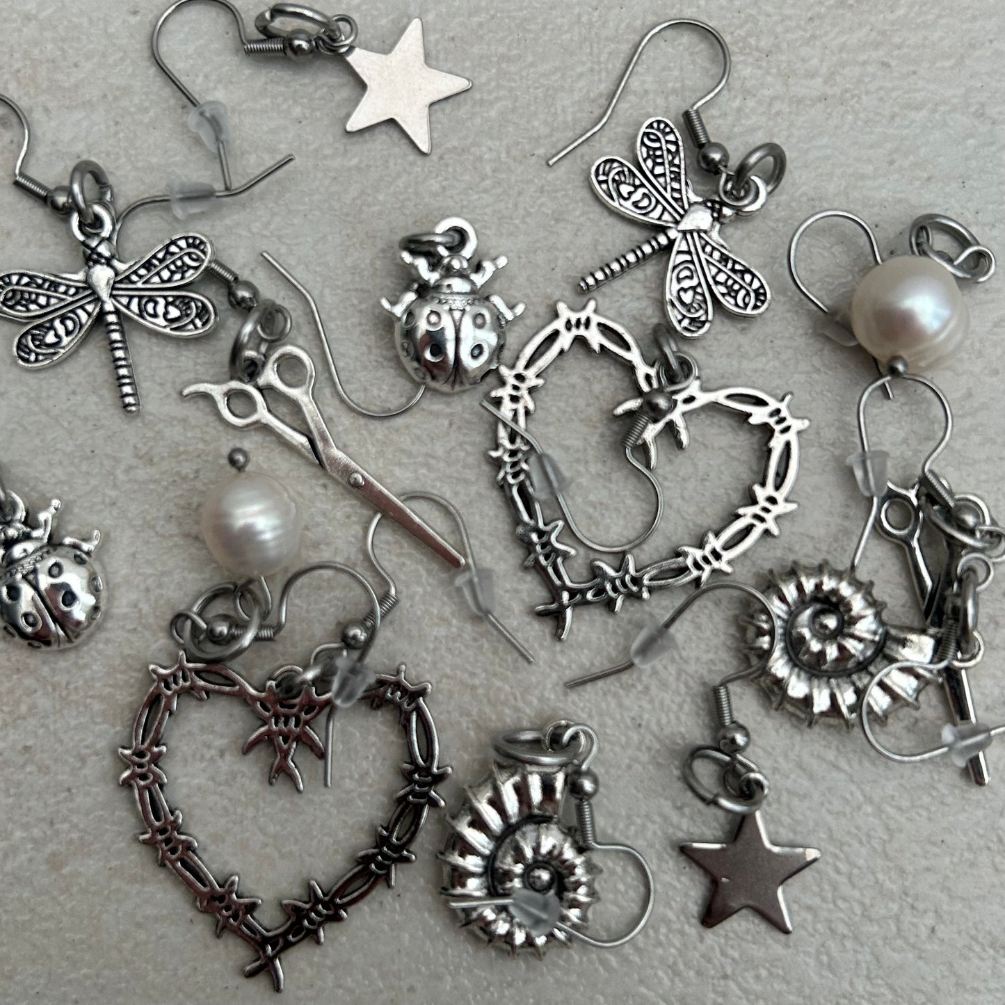 mystery earrings (silver tones)