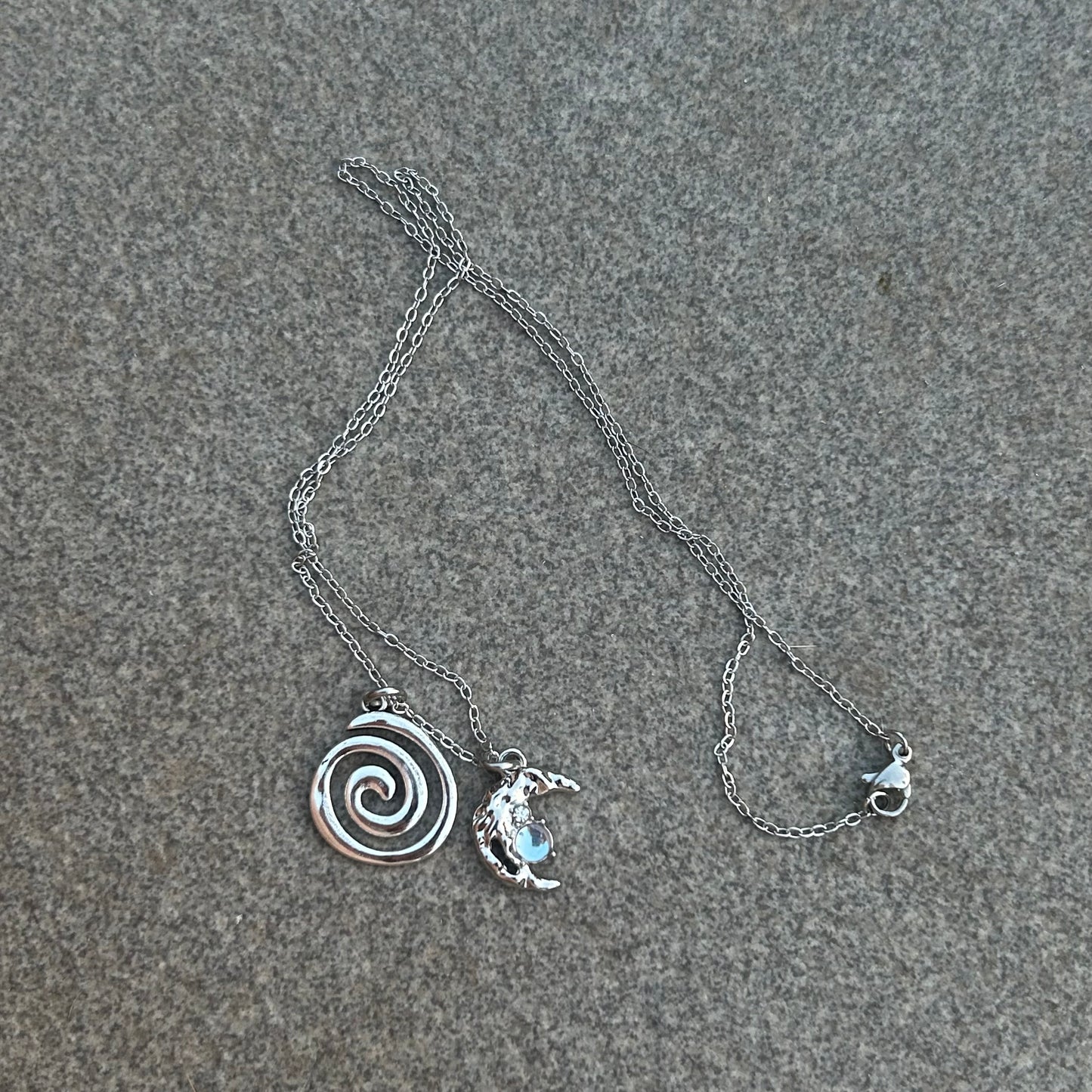 Crescent and spiral necklace