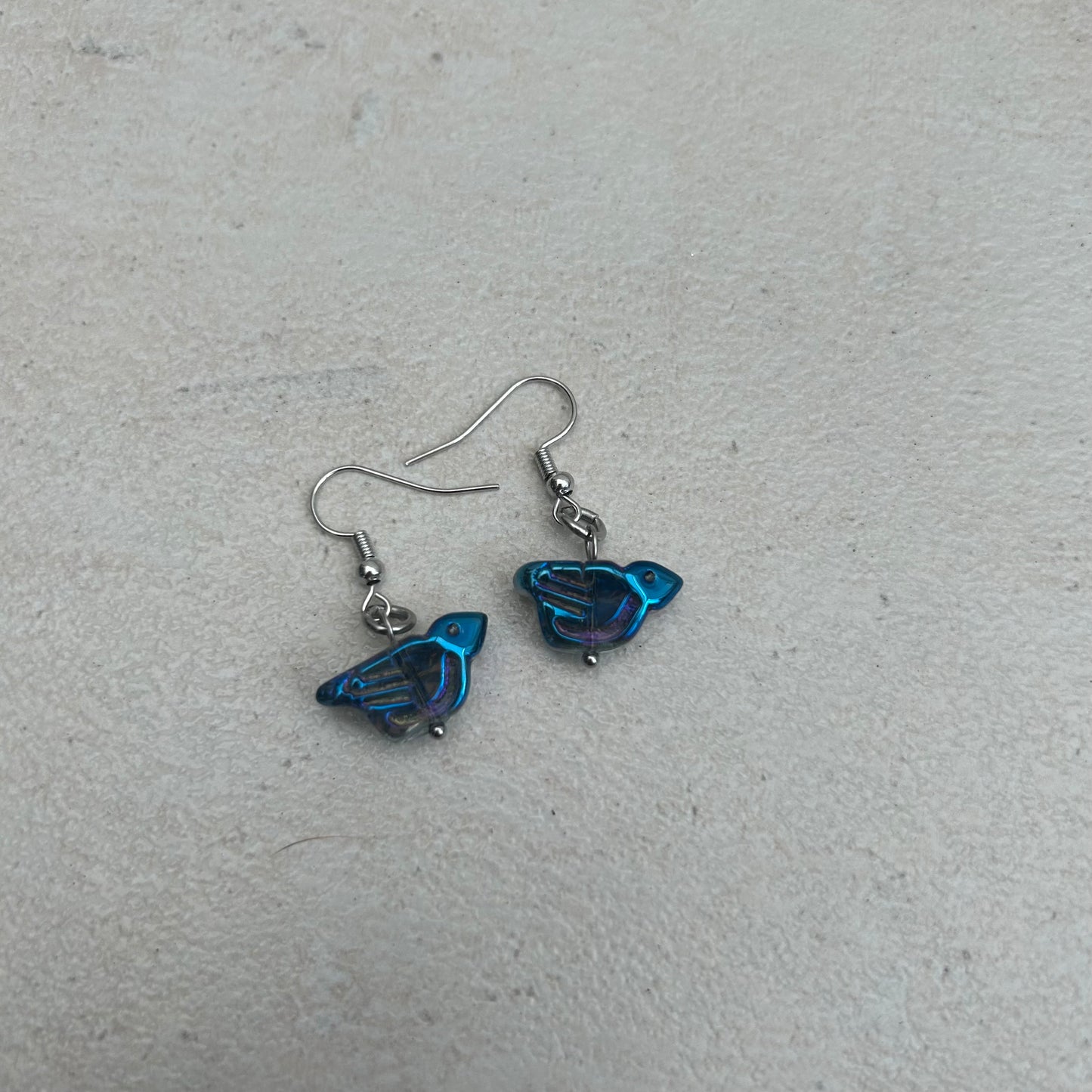Blue glass bird earrings